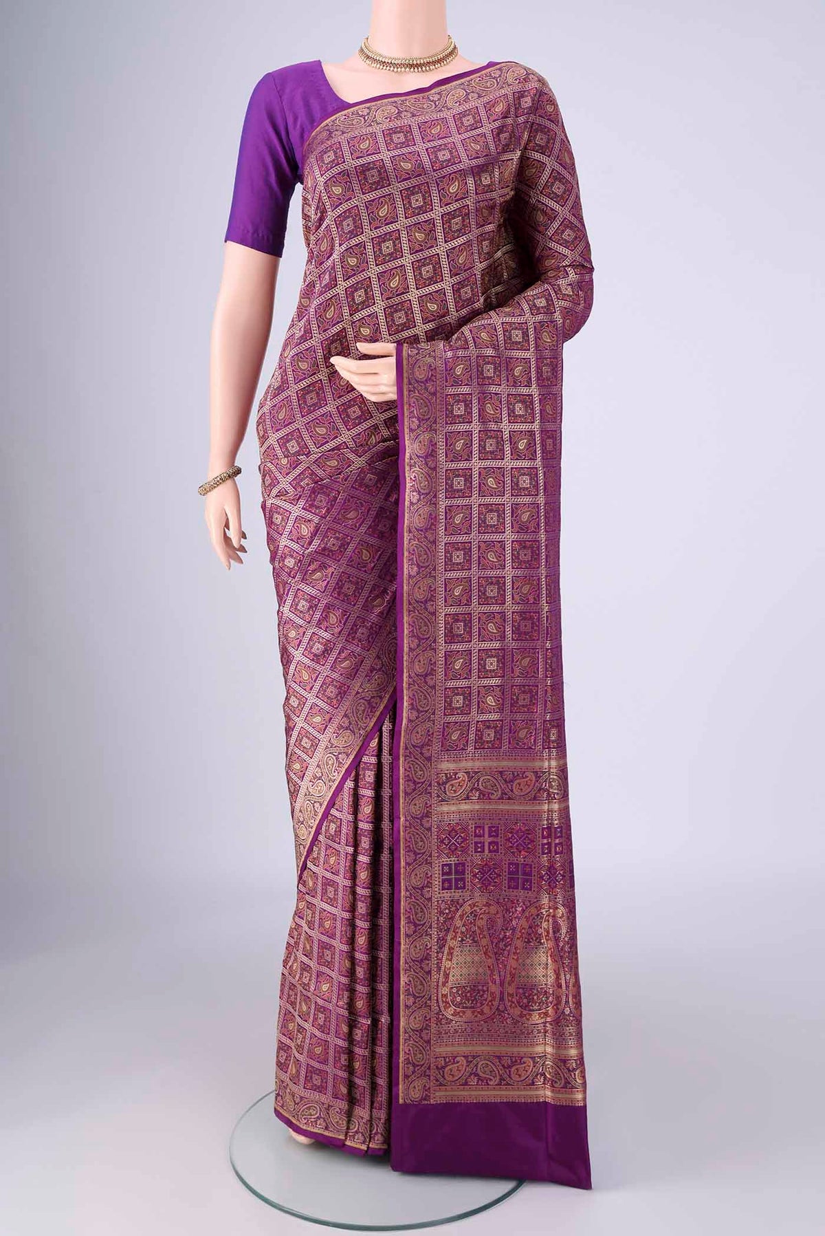 Purple Banarasi Jamavar Saree with Checked design on the body and Zari Border.  displayed on a mannequin