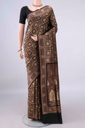 Pure Silk Black Banarasi Jamavar Saree with Checked design on the body and Zari Border.  displayed on a mannequin