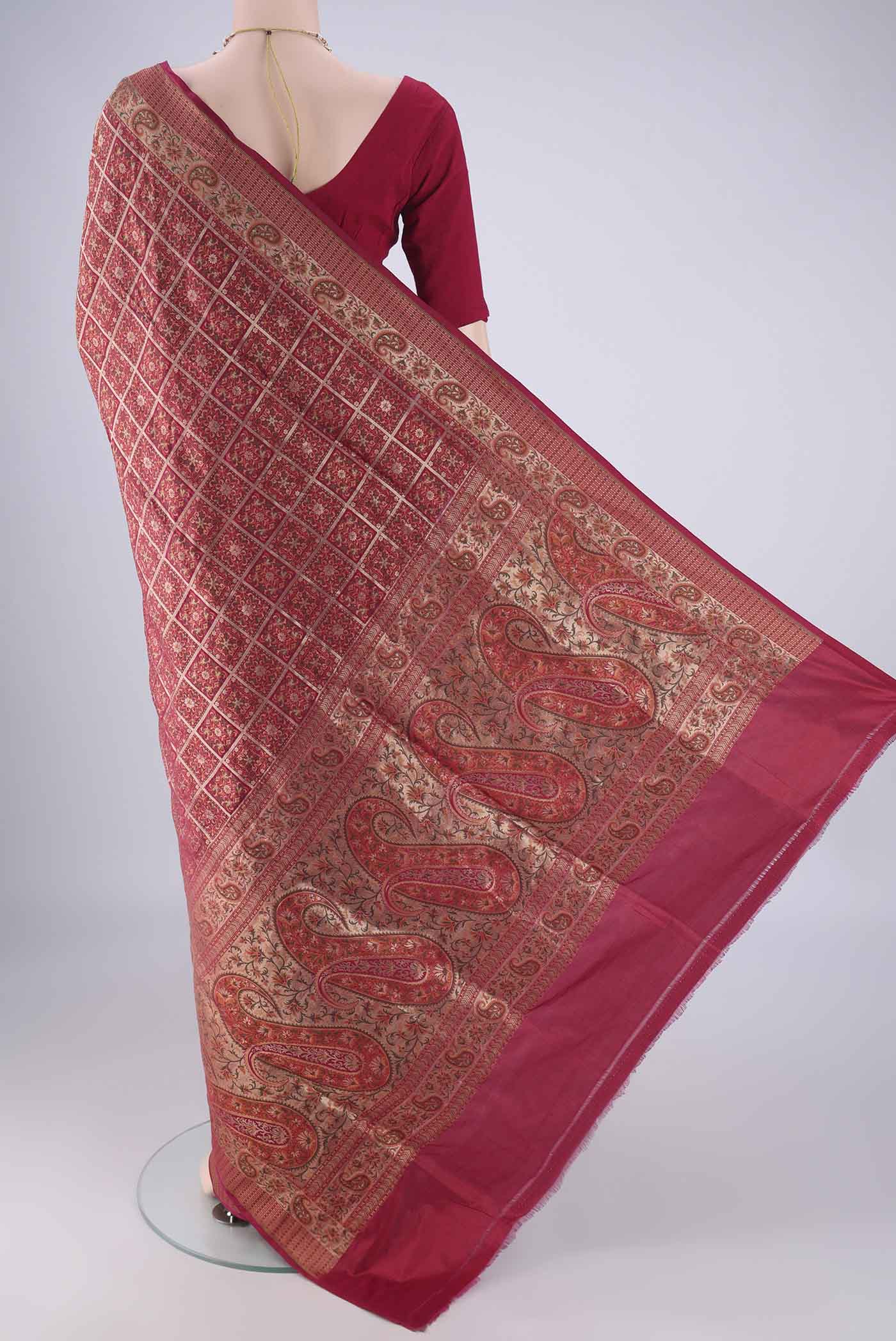 Flat view of Maroon Banarasi Jamavar Saree with Checked design on the body and Zari Border. 