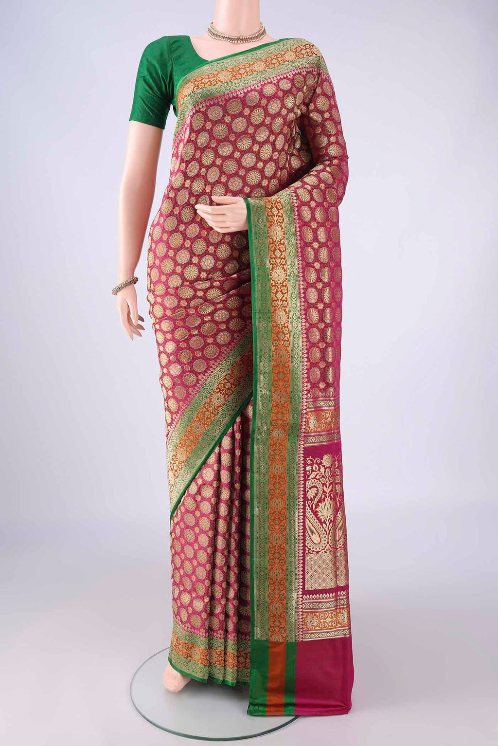Pink Banarasi Silk Saree with Zari Brocade on the body and Zari Border.  displayed on a mannequin