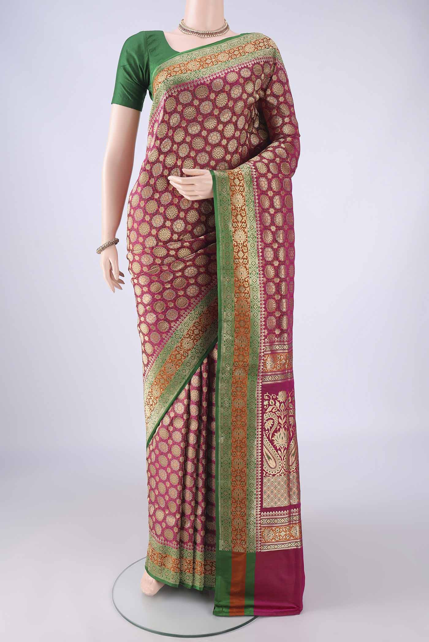 Pink Banarasi Silk Saree with Zari Brocade on the body and Zari Border.  displayed on a mannequin