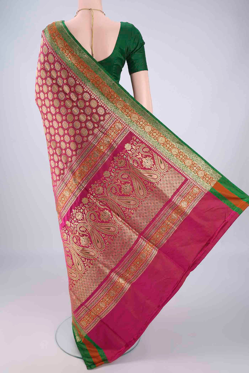 Flat view of Pink Banarasi Silk Saree with Zari Brocade on the body and Zari Border. 