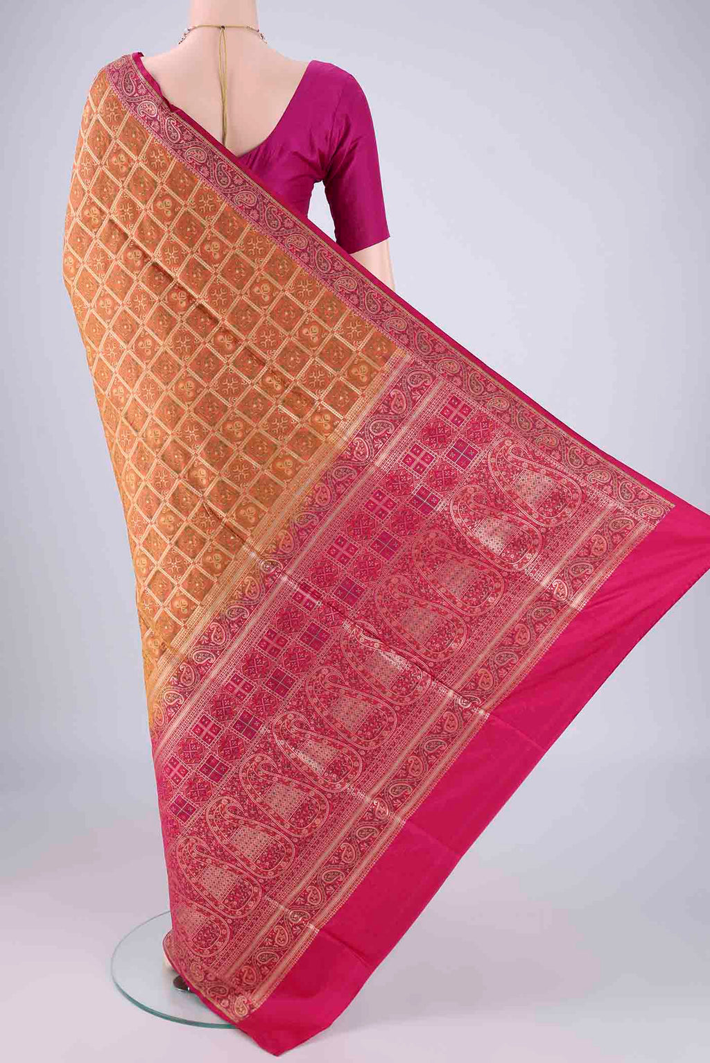 Flat view of Brick Orange Banarasi Jamavar Saree with Checked design on the body and Zari Border. 
