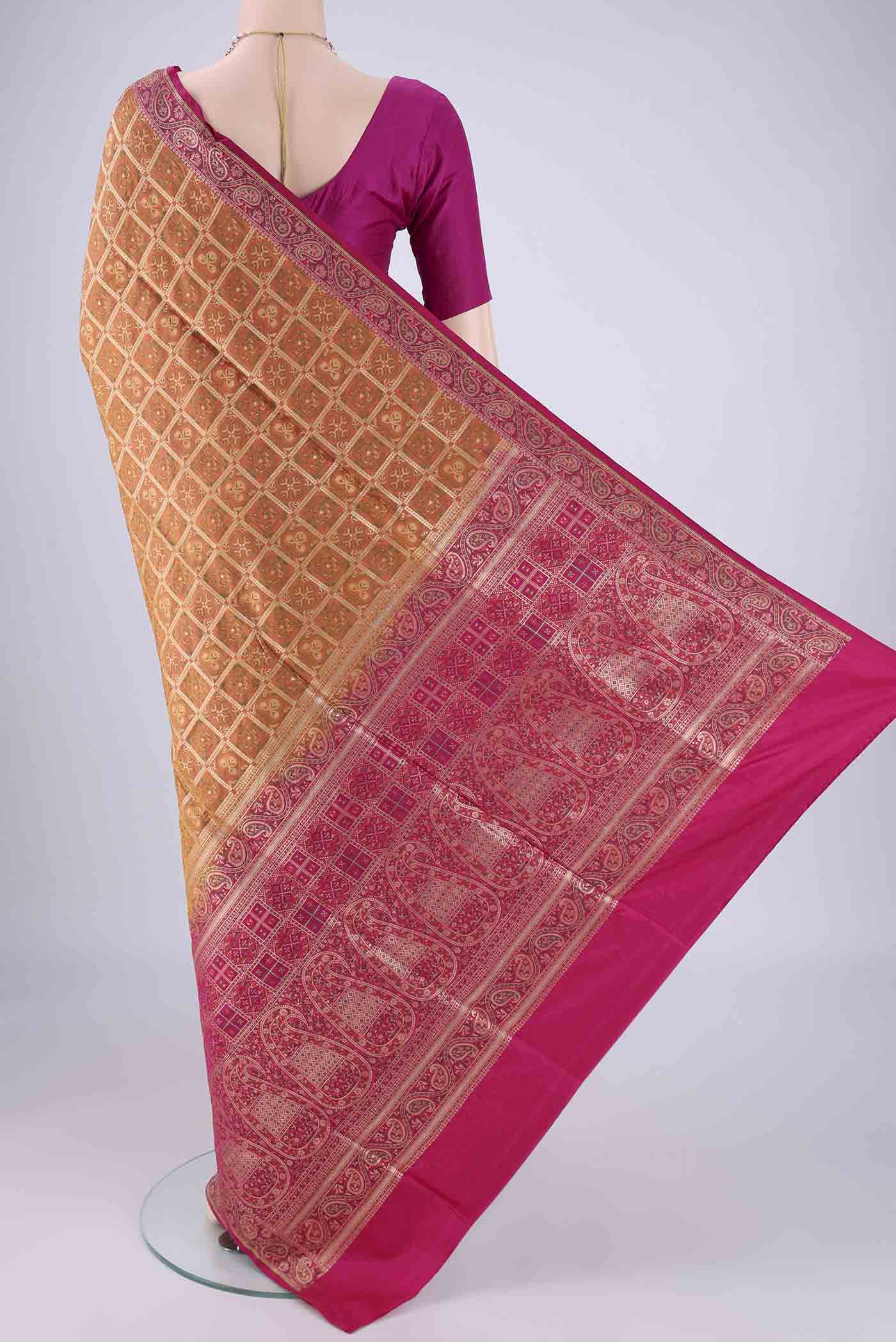 Flat view of Brick Orange Banarasi Jamavar Saree with Checked design on the body and Zari Border. 