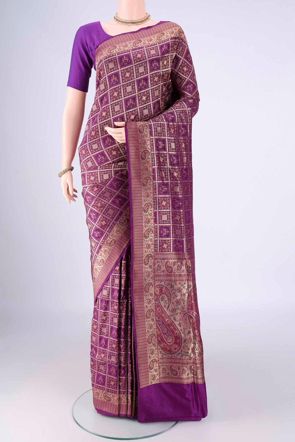 Purple Banarasi Jamavar Saree with Checked design on the body and Zari Border.  displayed on a mannequin