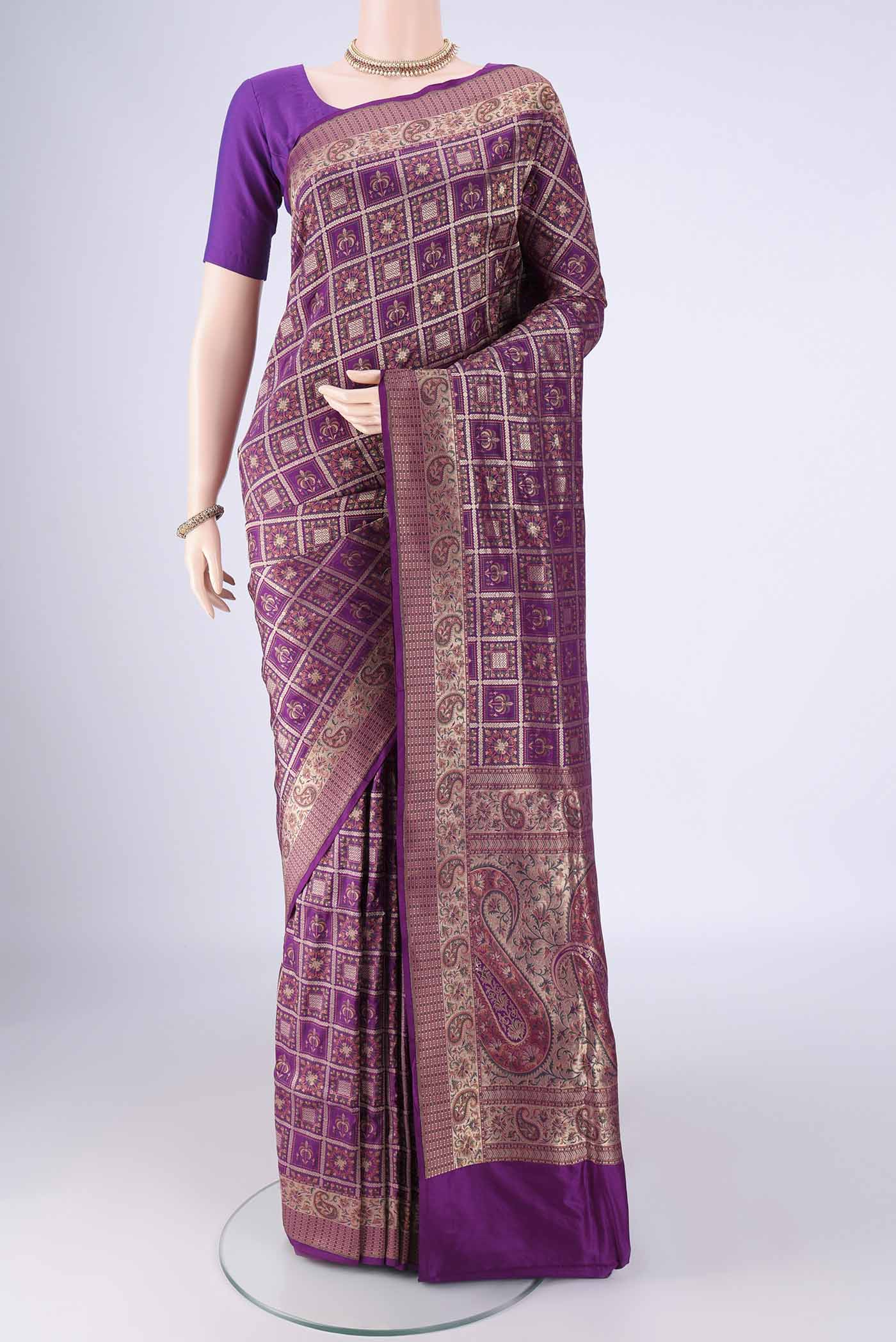 Purple Banarasi Jamavar Saree with Checked design on the body and Zari Border.  displayed on a mannequin