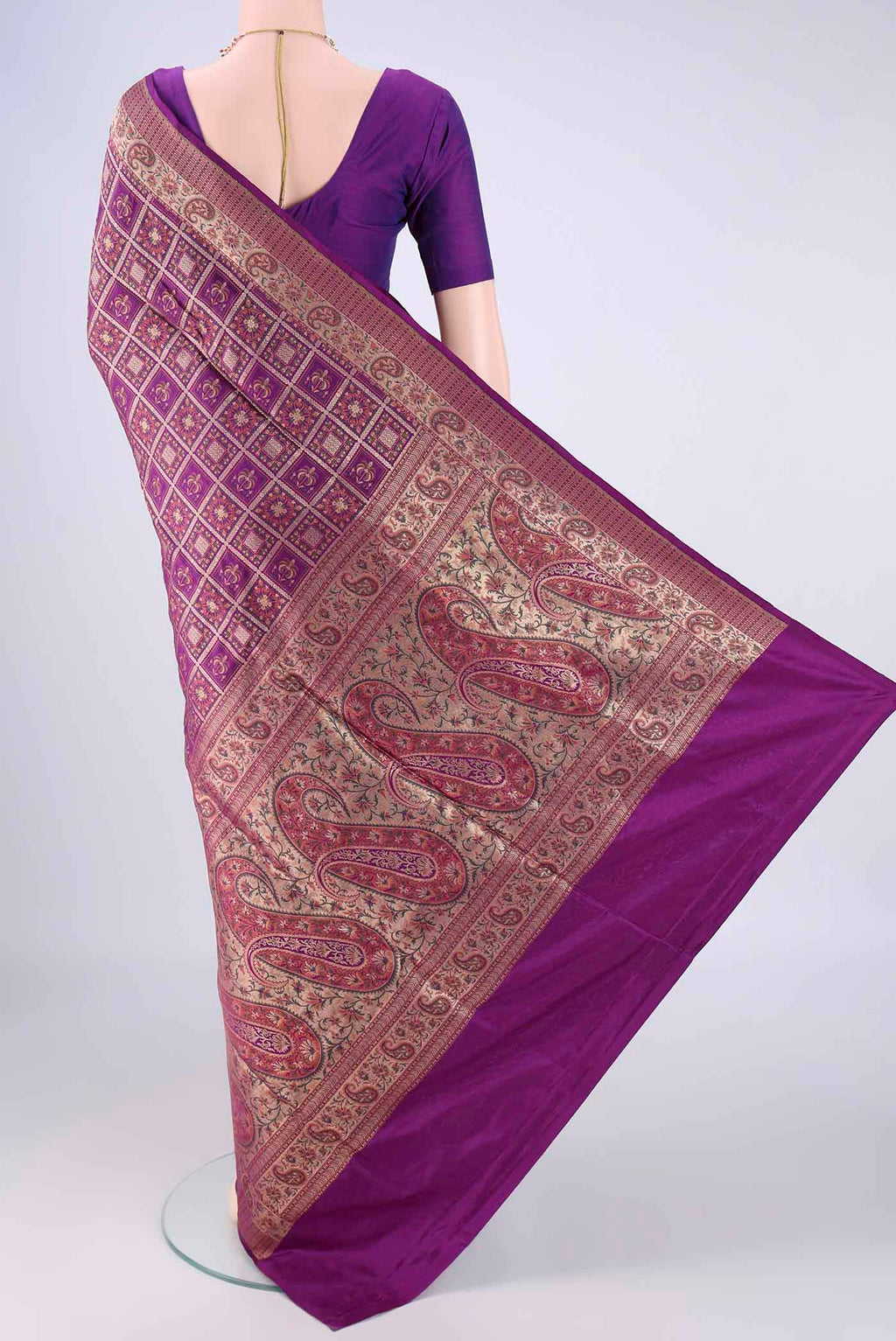 Flat view of Purple Banarasi Jamavar Saree with Checked design on the body and Zari Border. 