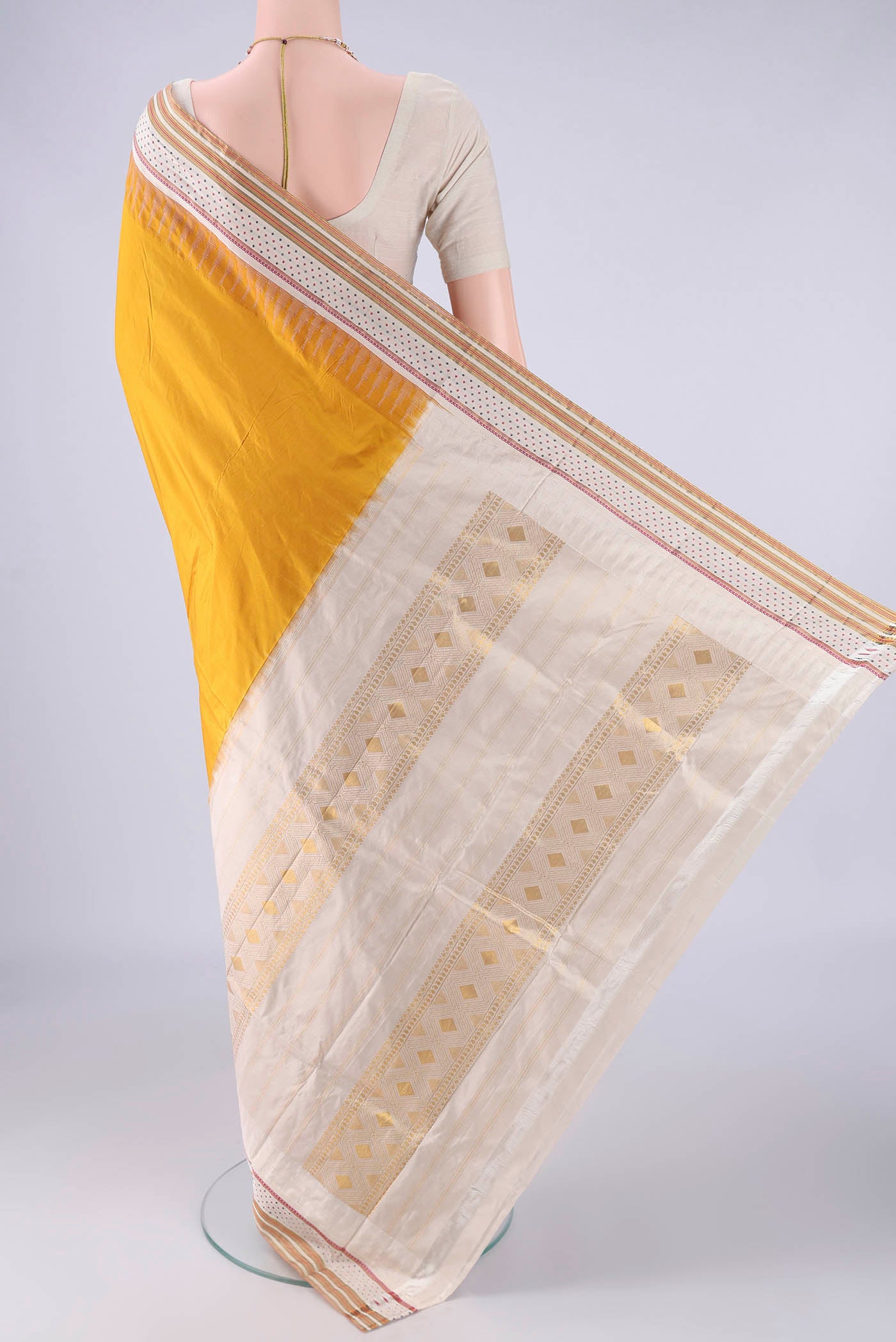 Flat view of Mustard Bangalore Silk - kadyal Saree with Plain Body and Temple Border. 