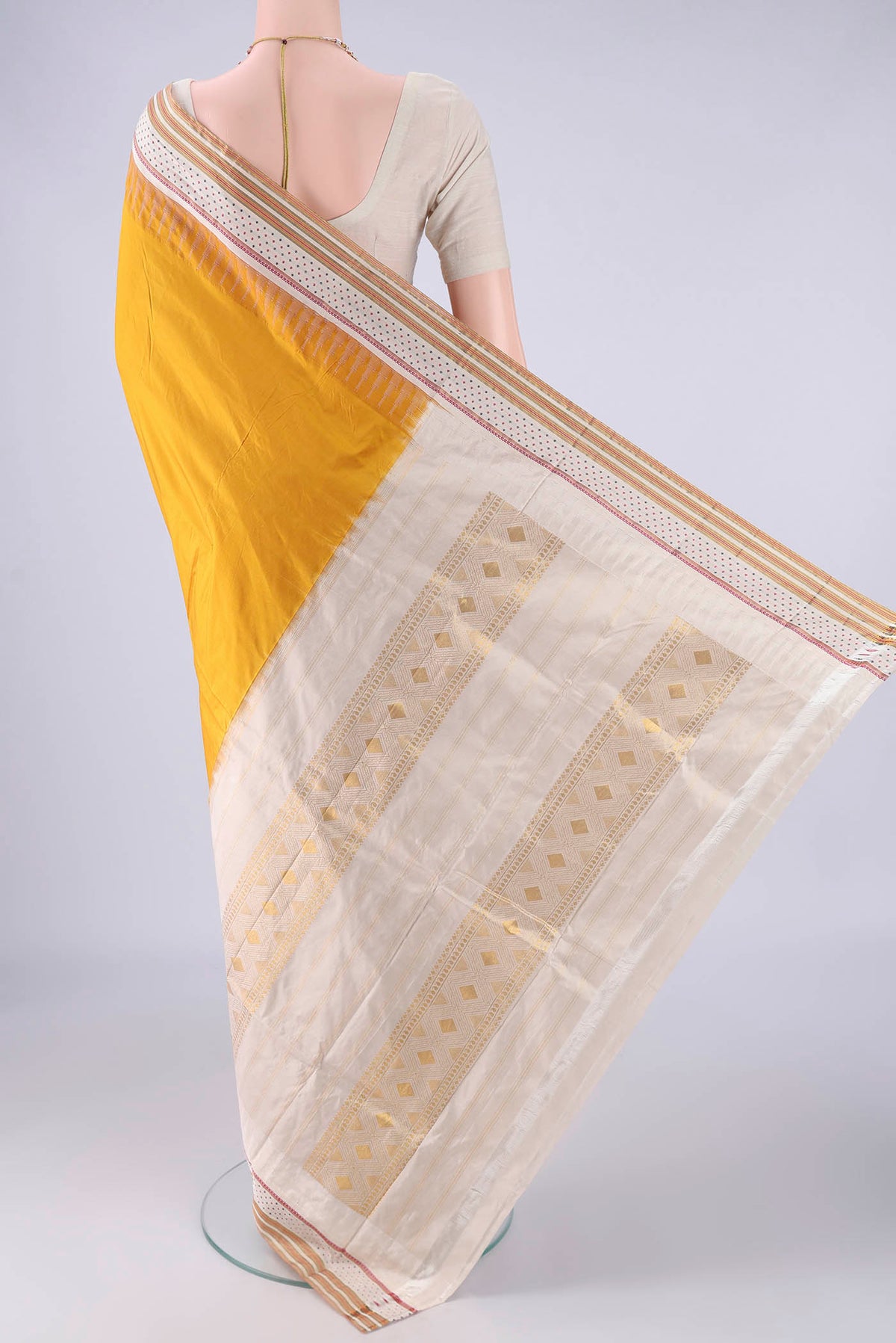 Flat view of Mustard Bangalore Silk - kadyal Saree with Plain Body and Temple Border. 