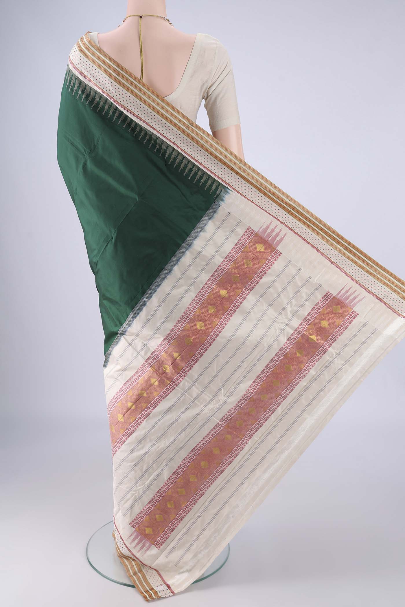 Flat view of Bottle Green Bangalore Silk - kadyal Saree with Plain Body and Zari And Thread Border. 