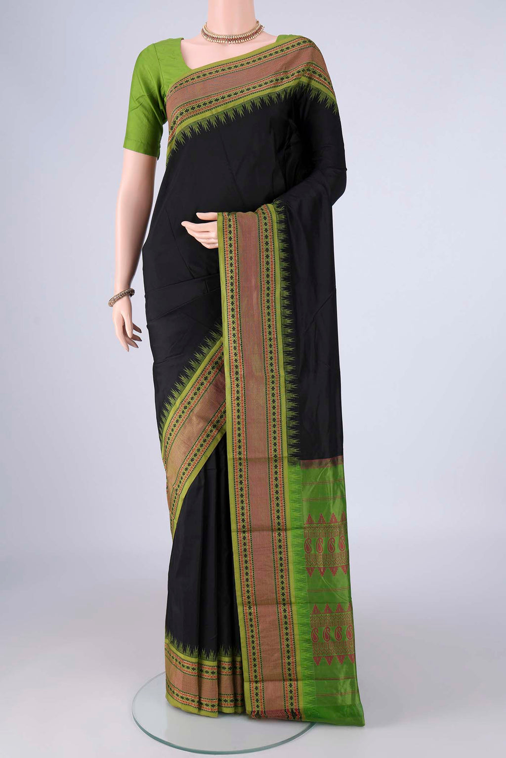 Black Bangalore Silk - kadyal Saree with Plain Body and Temple Border.  displayed on a mannequin
