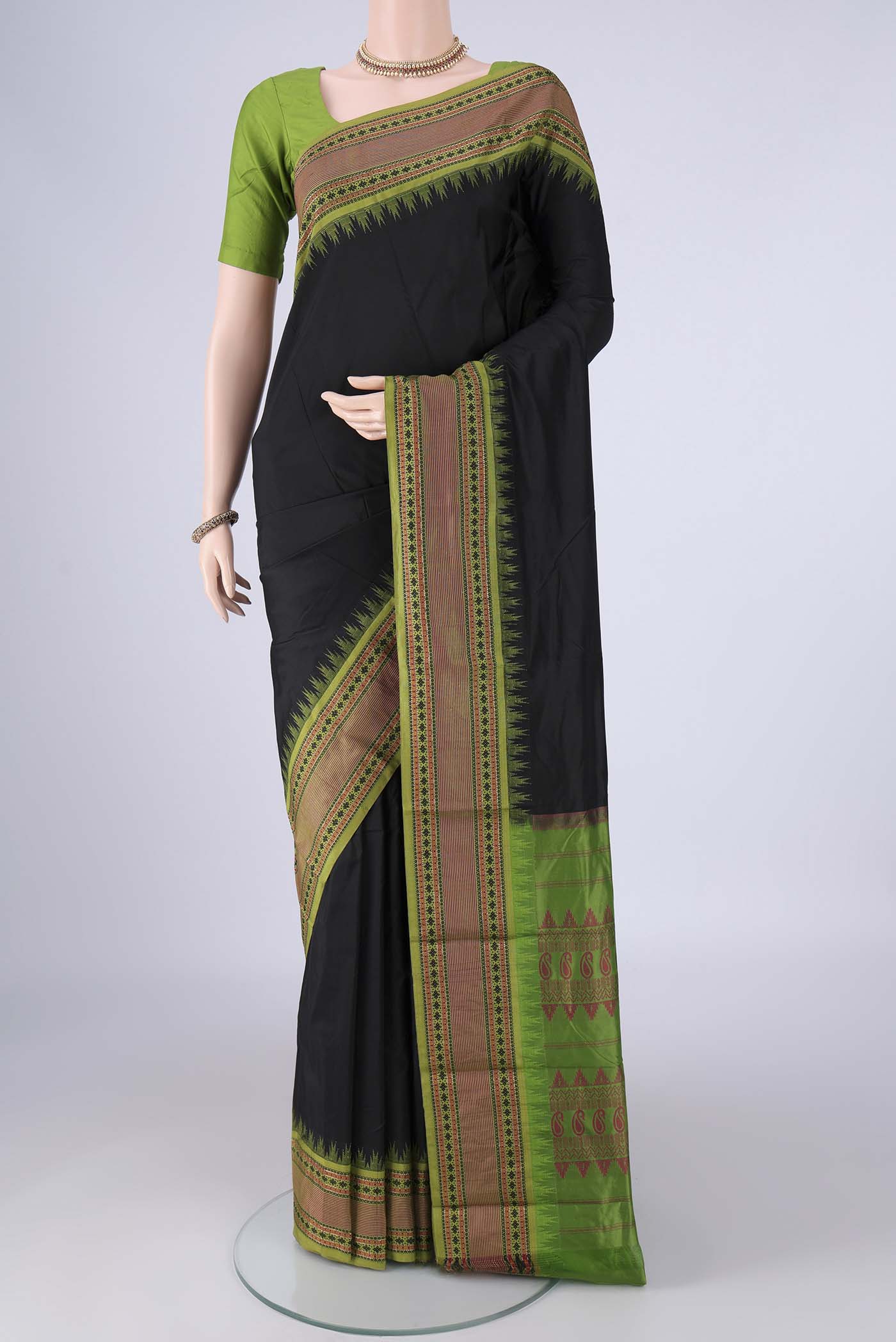 Black Bangalore Silk - kadyal Saree with Plain Body and Temple Border.  displayed on a mannequin