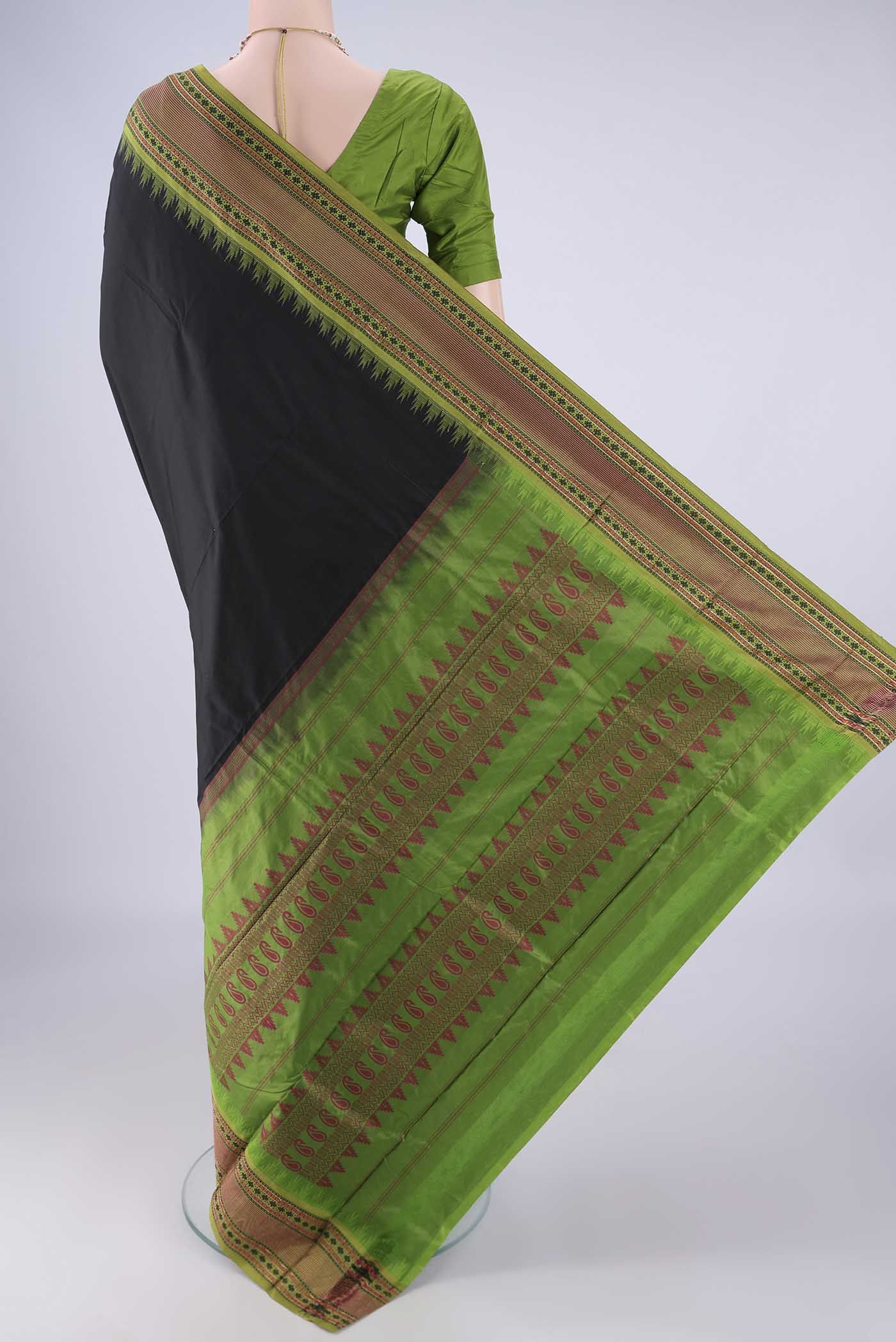 Flat view of Black Bangalore Silk - kadyal Saree with Plain Body and Temple Border. 
