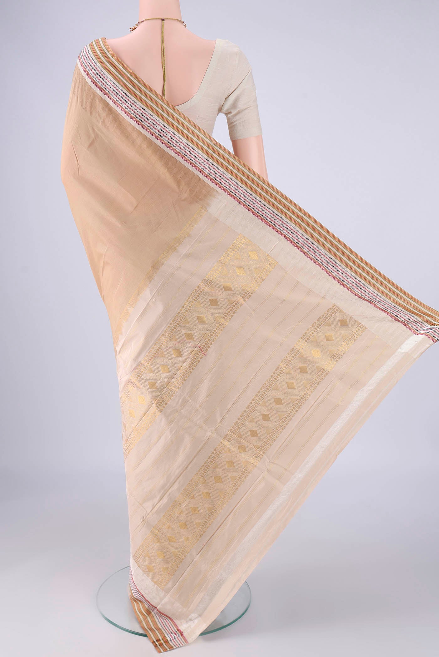 Flat view of Beige Bangalore Silk - kadyal Saree with Plain Body and Temple Border. 