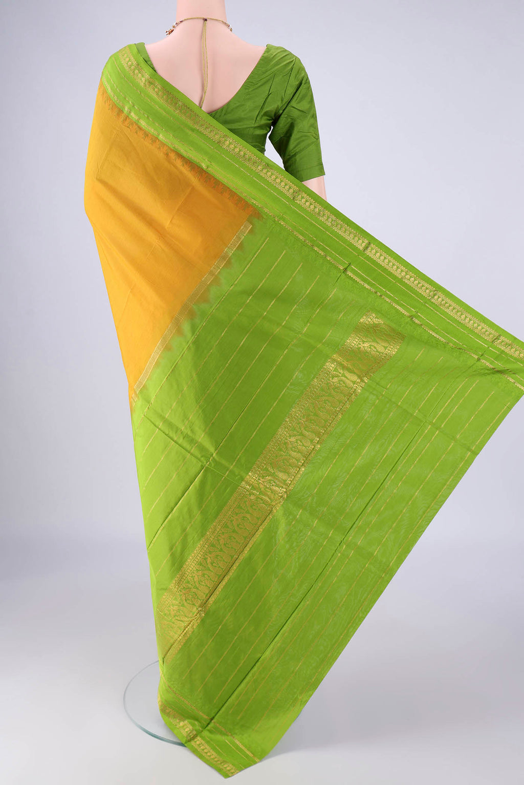 Flat view of Mustard Bangalore Silk - kadyal Saree with Plain Body and Temple Border. 