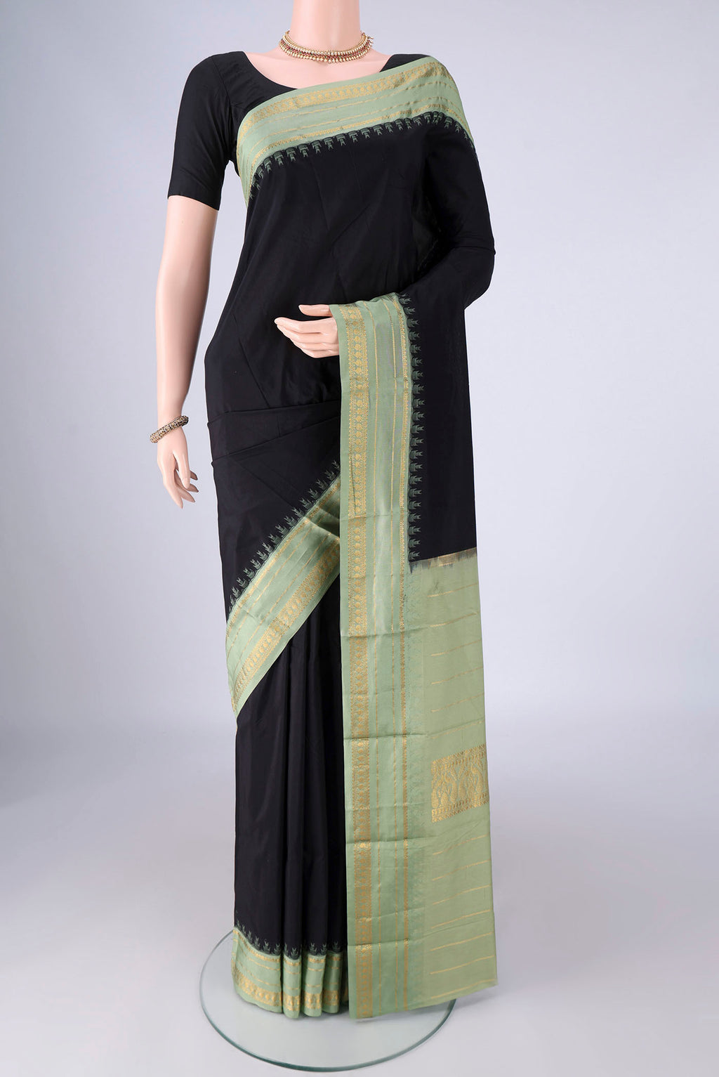 Black Bangalore Silk - kadyal Saree with Plain Body and Zari And Thread Border.  displayed on a mannequin