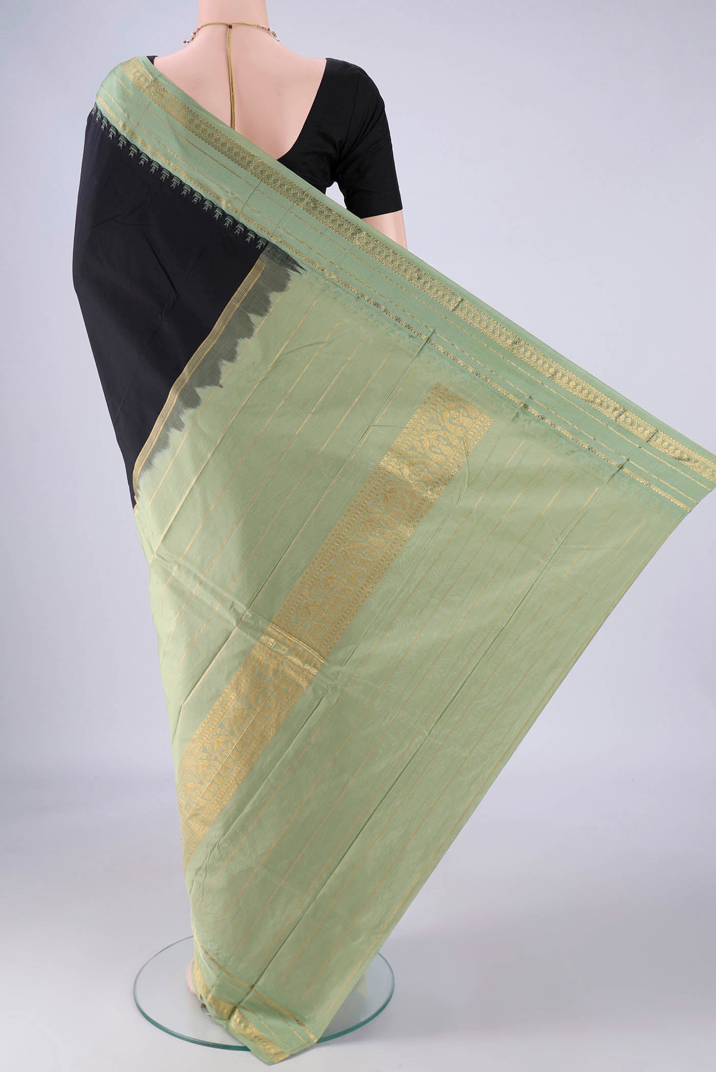 Flat view of Black Bangalore Silk - kadyal Saree with Plain Body and Zari And Thread Border. 
