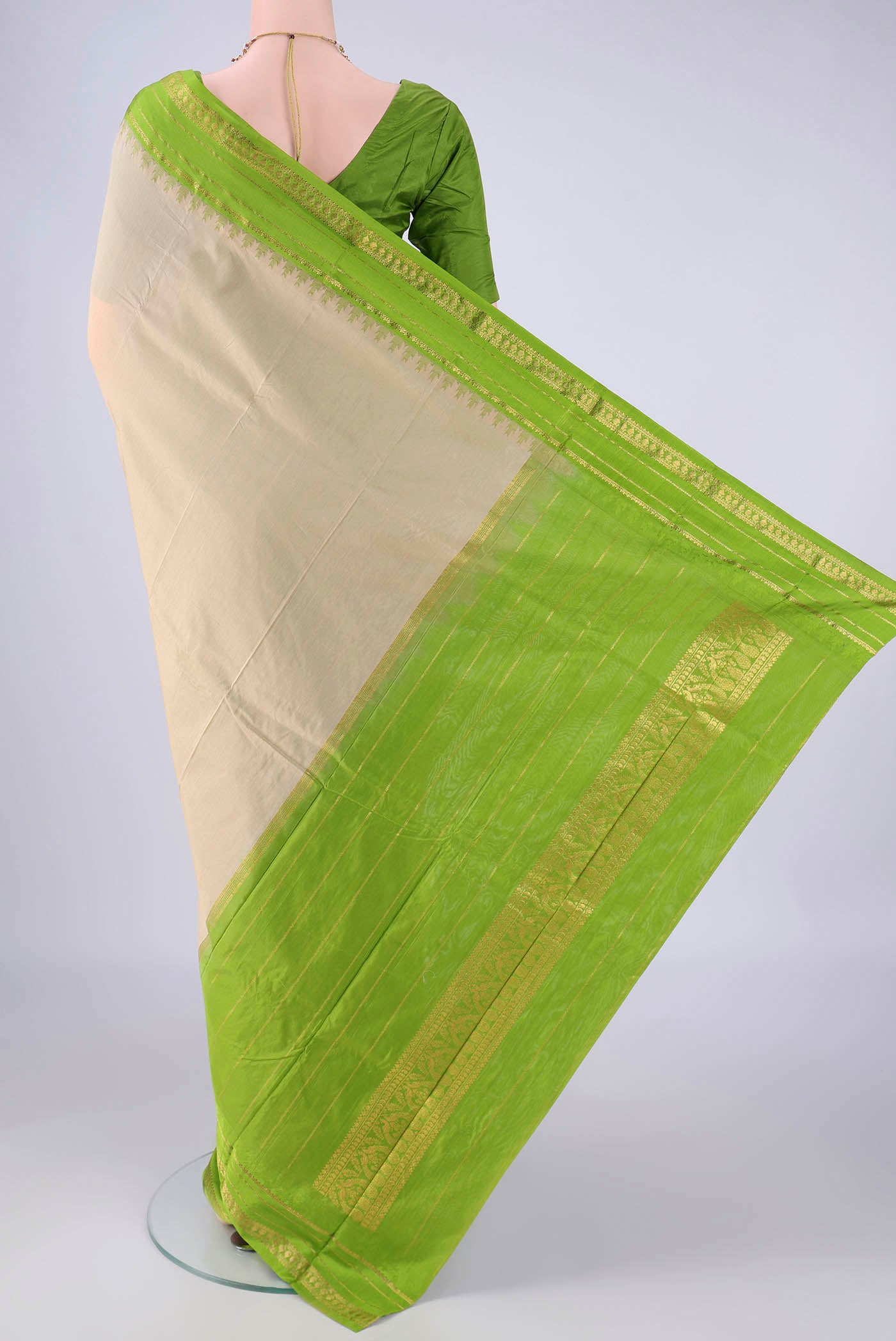 Flat view of Beige Bangalore Silk - kadyal Saree with Plain Body and Temple Border. 