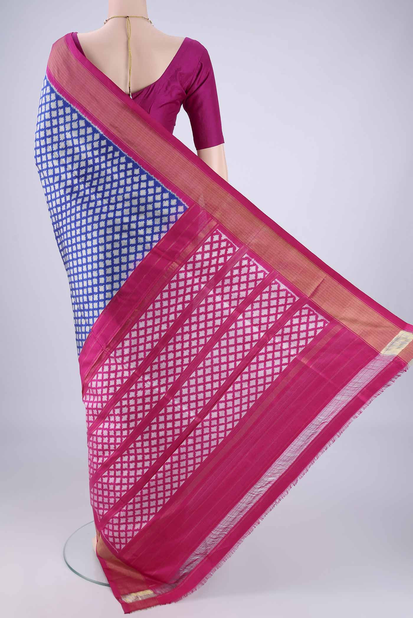 Flat view of Blue Pochampally Silk Saree with Pure Ikat on the body and Zari Border. 