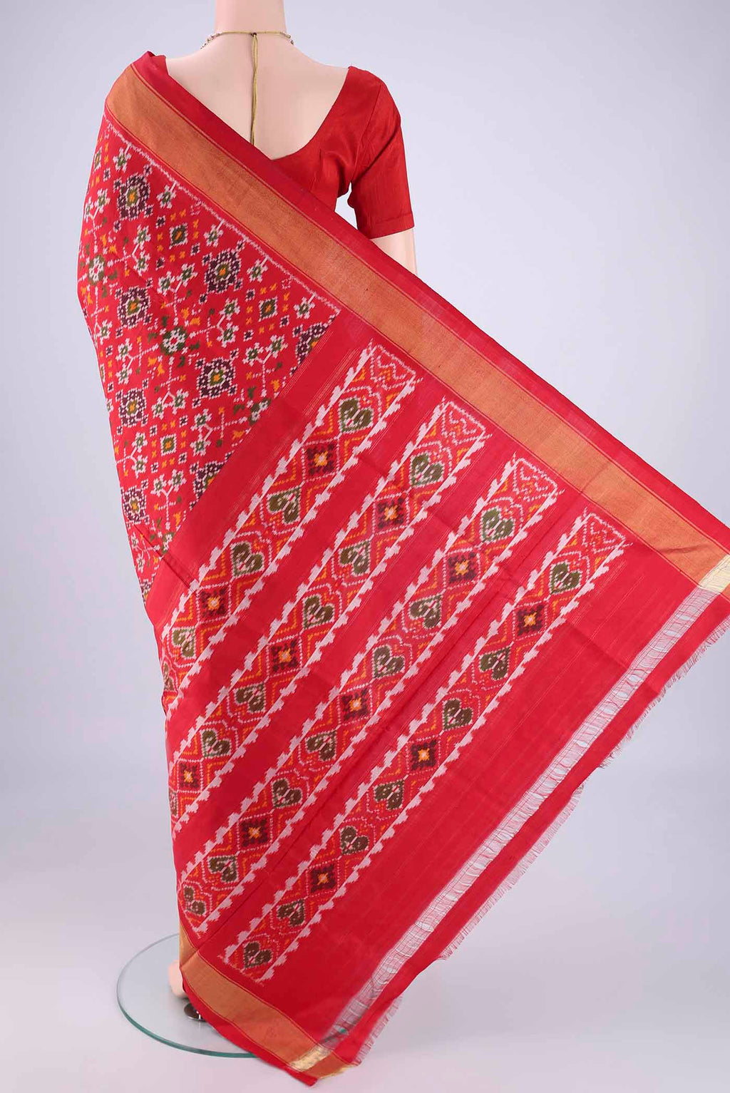 Flat view of Red Pochampally Silk Saree with Pure Ikat on the body and Zari Border. 
