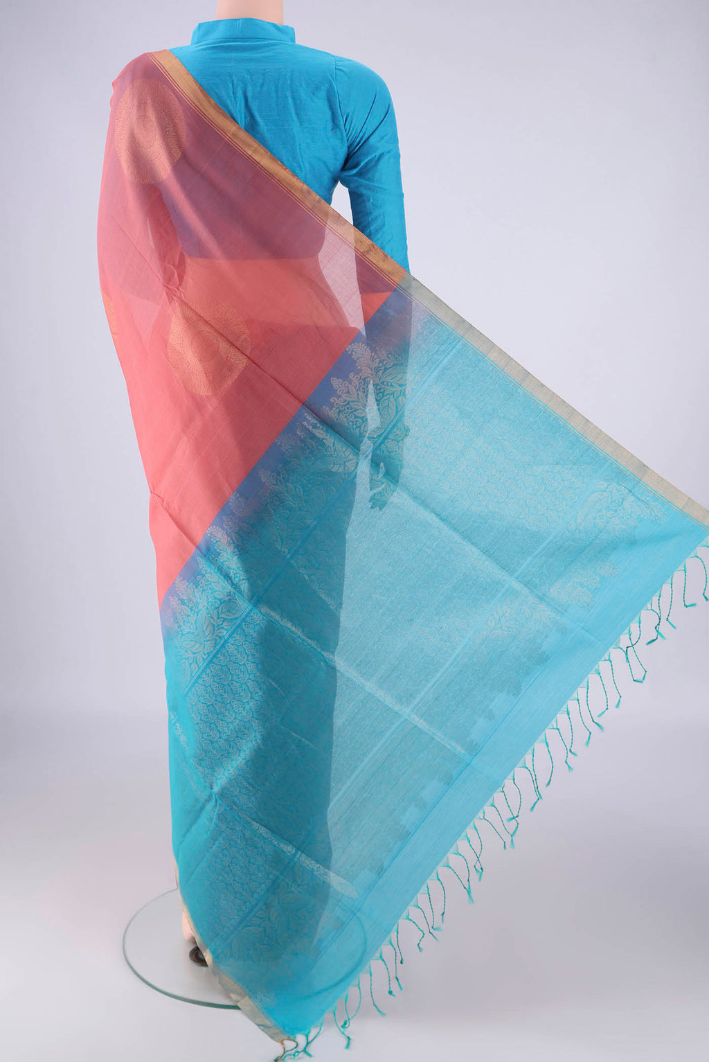Flat view of Rose pink Silk Cotton Saree with Zari Butta on the body and Zari Border. 