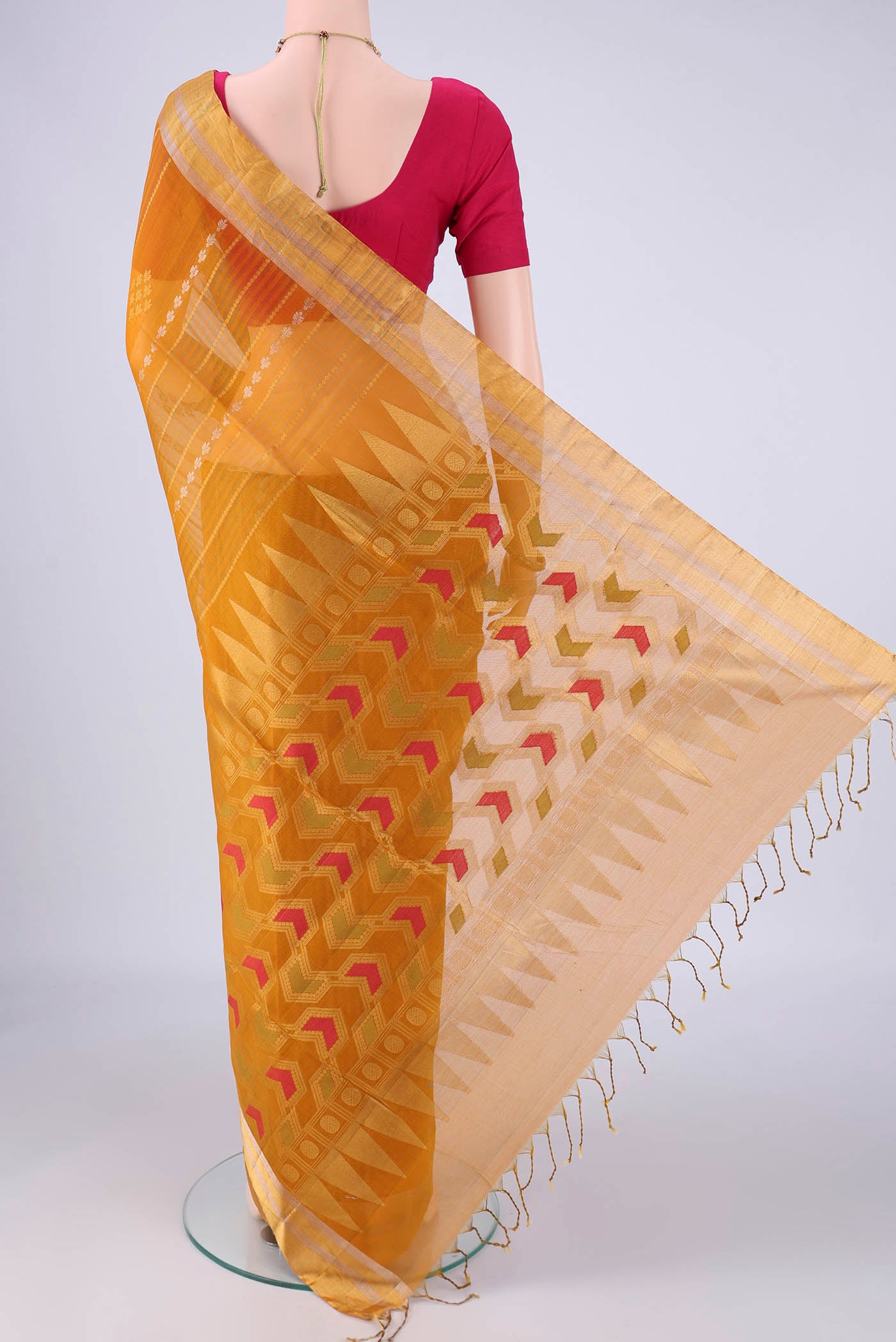 Flat view of Mustard Chanderi Silk Cotton Saree with Zari Butta on the body and Zari Border. 