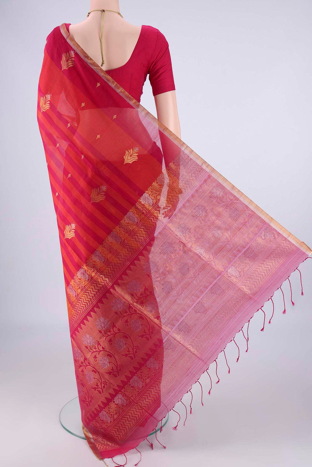 Flat view of Multi Color Silk Cotton Saree with Stripes on the body and Zari Border. 