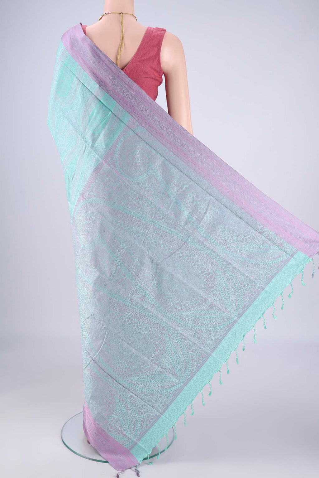 Flat view of Mint Green Soft Silk Saree with Jacquard design on the body and Thread Border. 