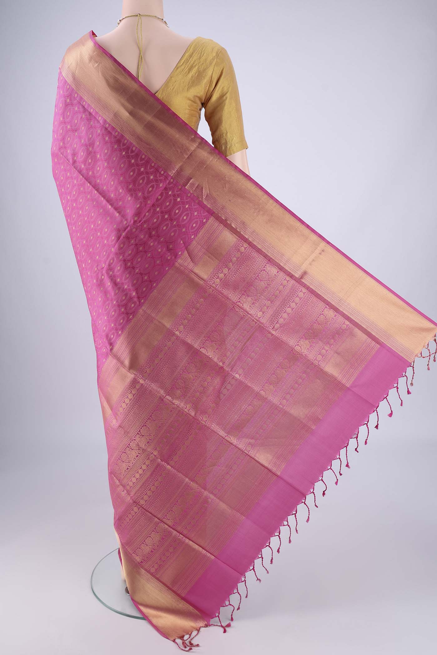 Flat view of Pink Soft Silk Saree with Jacquard With Zari Butta on the body and Zari Border. 