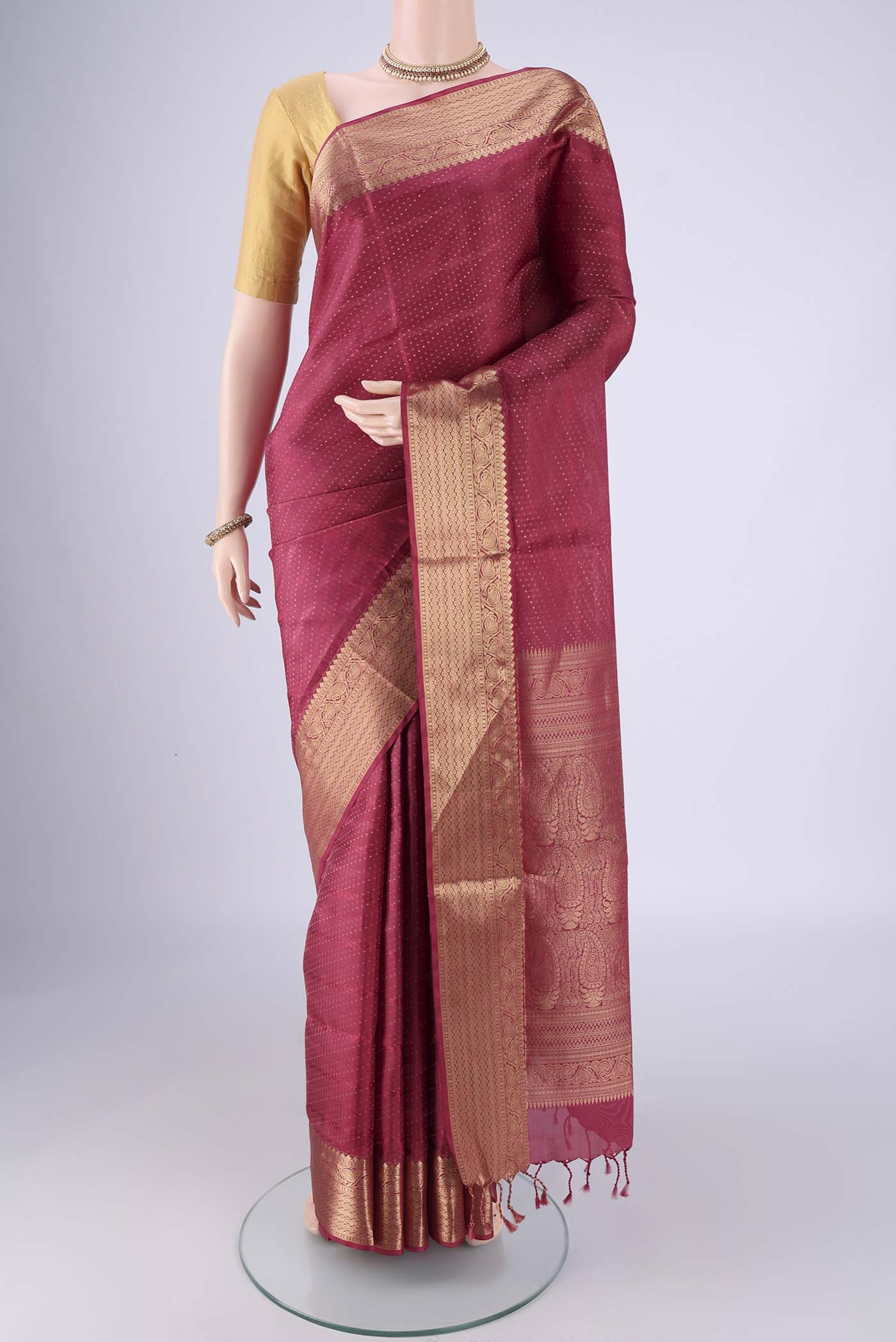 Dark Pink Soft Silk Saree with Jacquard With Zari Butta on the body and Zari Border.  displayed on a mannequin