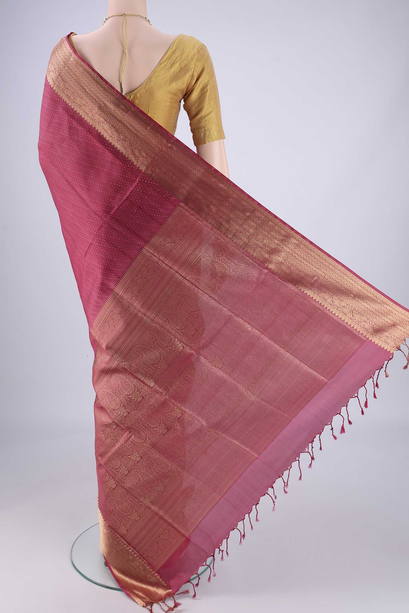 Flat view of Dark Pink Soft Silk Saree with Jacquard With Zari Butta on the body and Zari Border. 