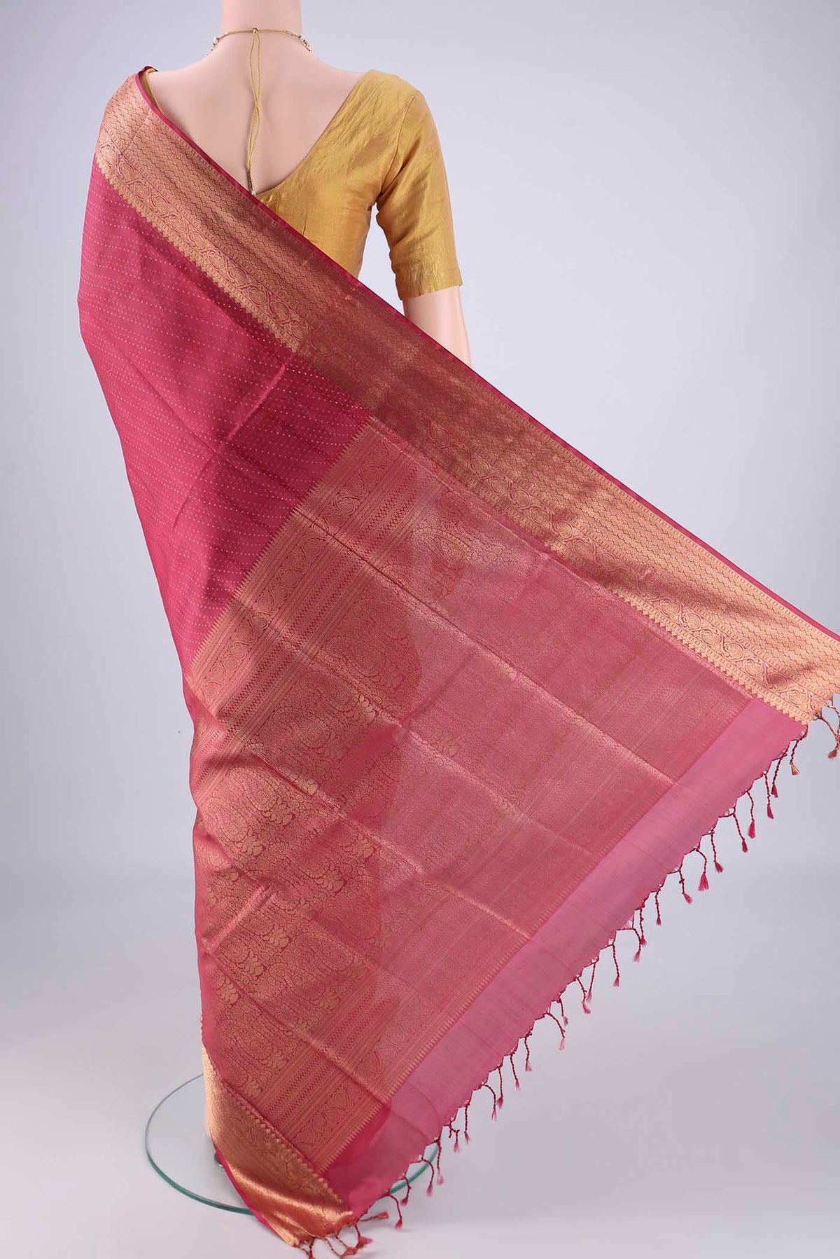 Flat view of Dark Pink Soft Silk Saree with Jacquard With Zari Butta on the body and Zari Border. 