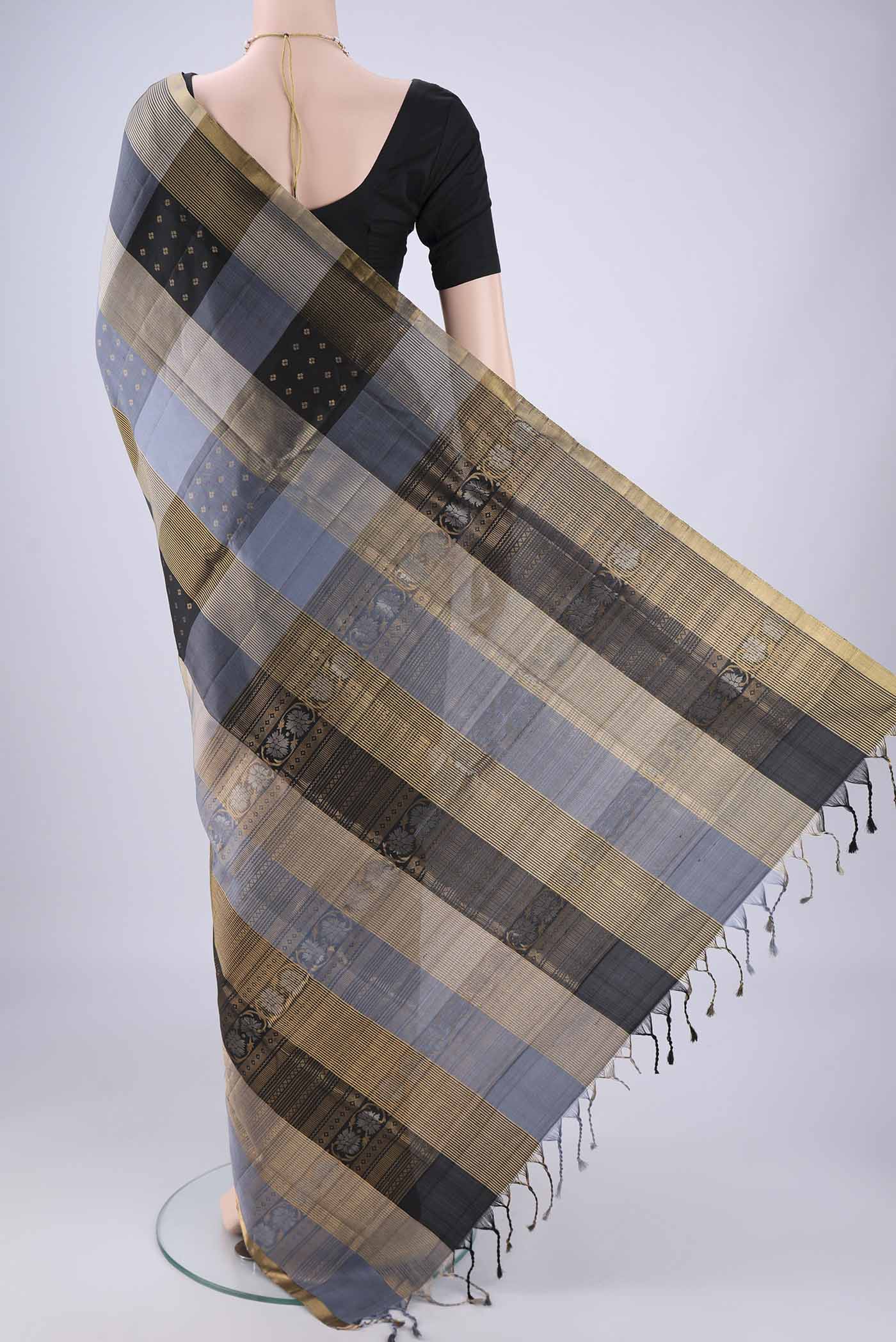 Flat view of Multi Color Soft Silk Saree with Checked design on the body and Zari Border. 