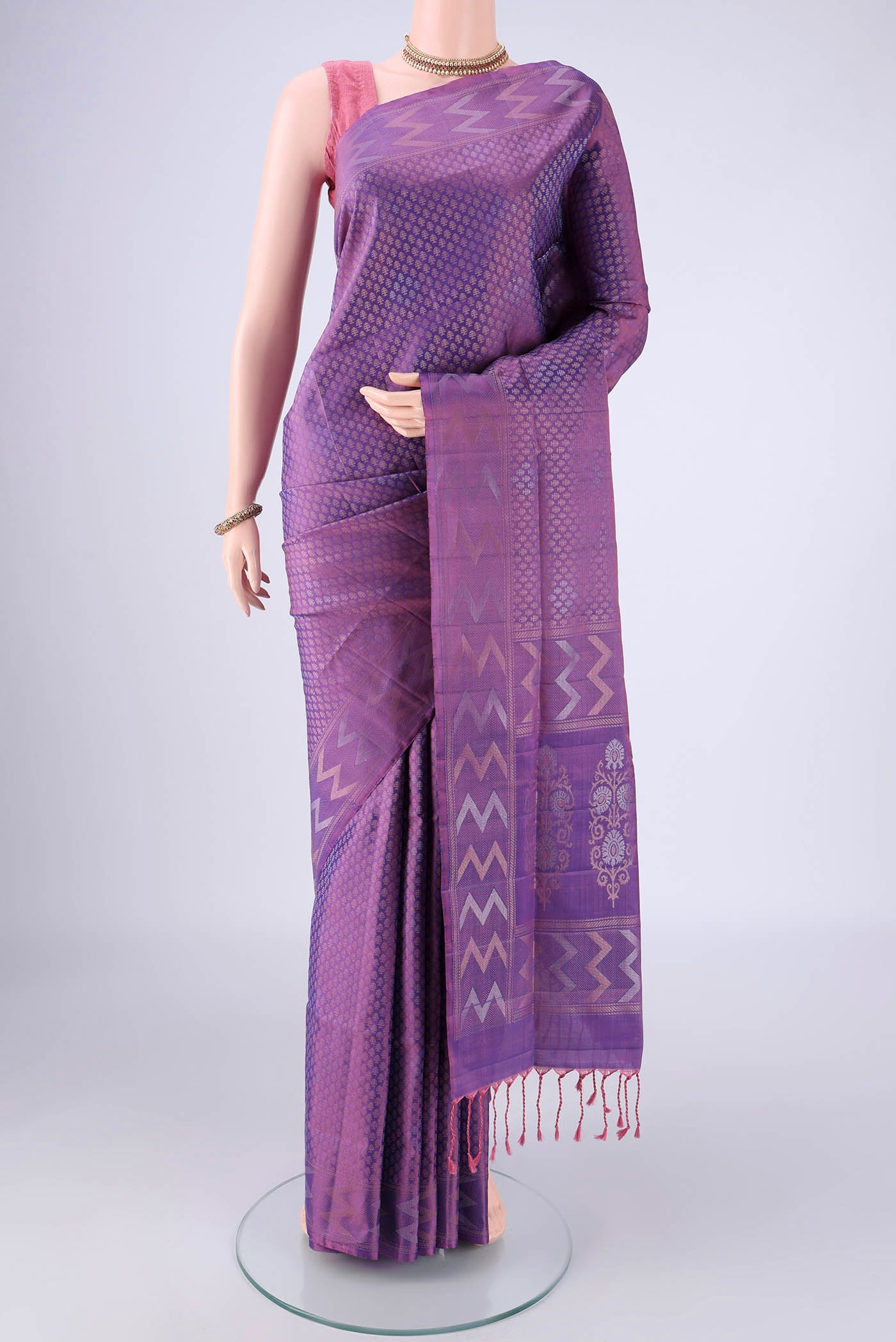 Purple Soft Silk Saree with Zari Brocade on the body and Zari Border.  displayed on a mannequin
