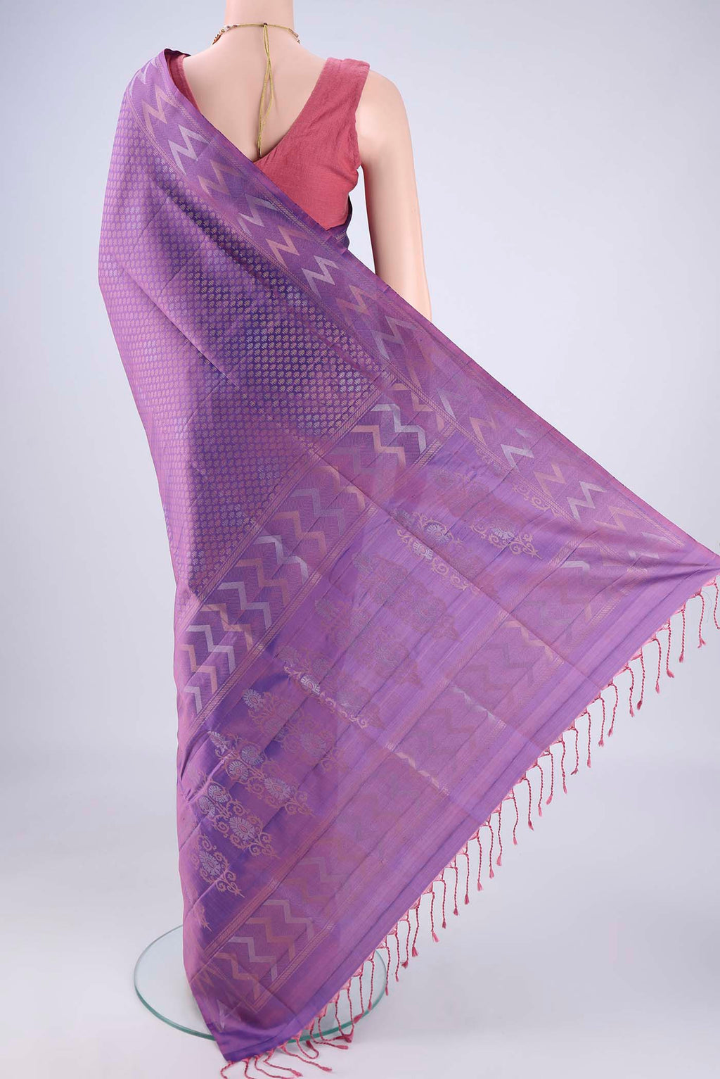Flat view of Purple Soft Silk Saree with Zari Brocade on the body and Zari Border. 