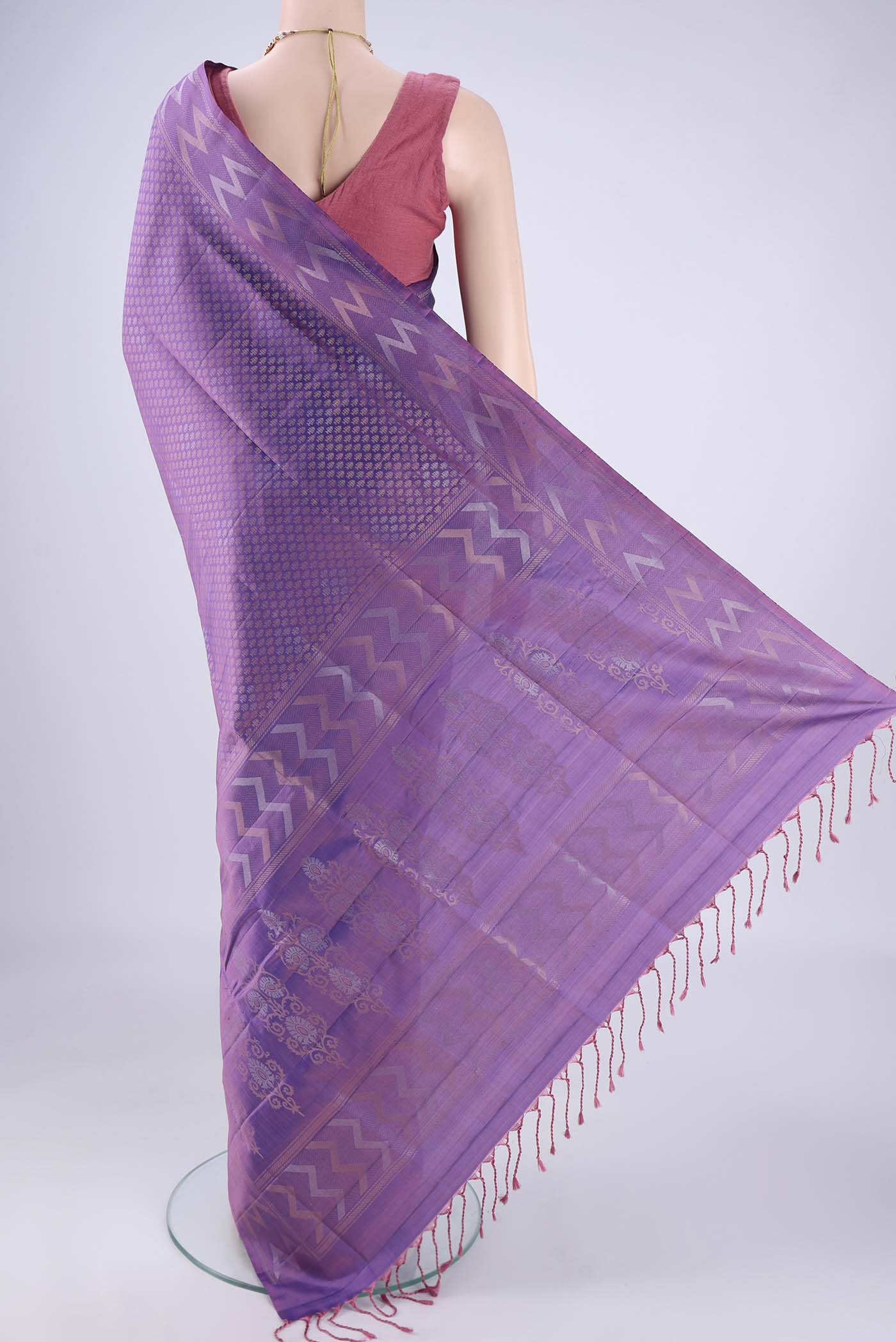 Flat view of Purple Soft Silk Saree with Zari Brocade on the body and Zari Border. 