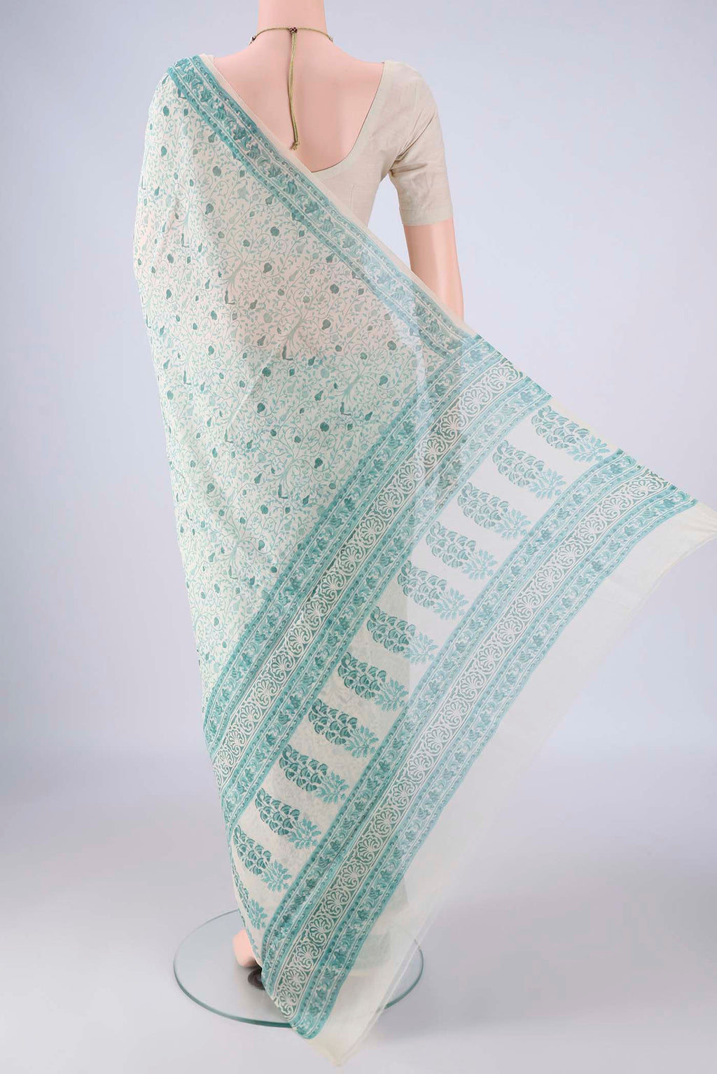 Flat view of Off White Chanderi Silk Cotton Saree with Floral Print on the body and Printed Border. 