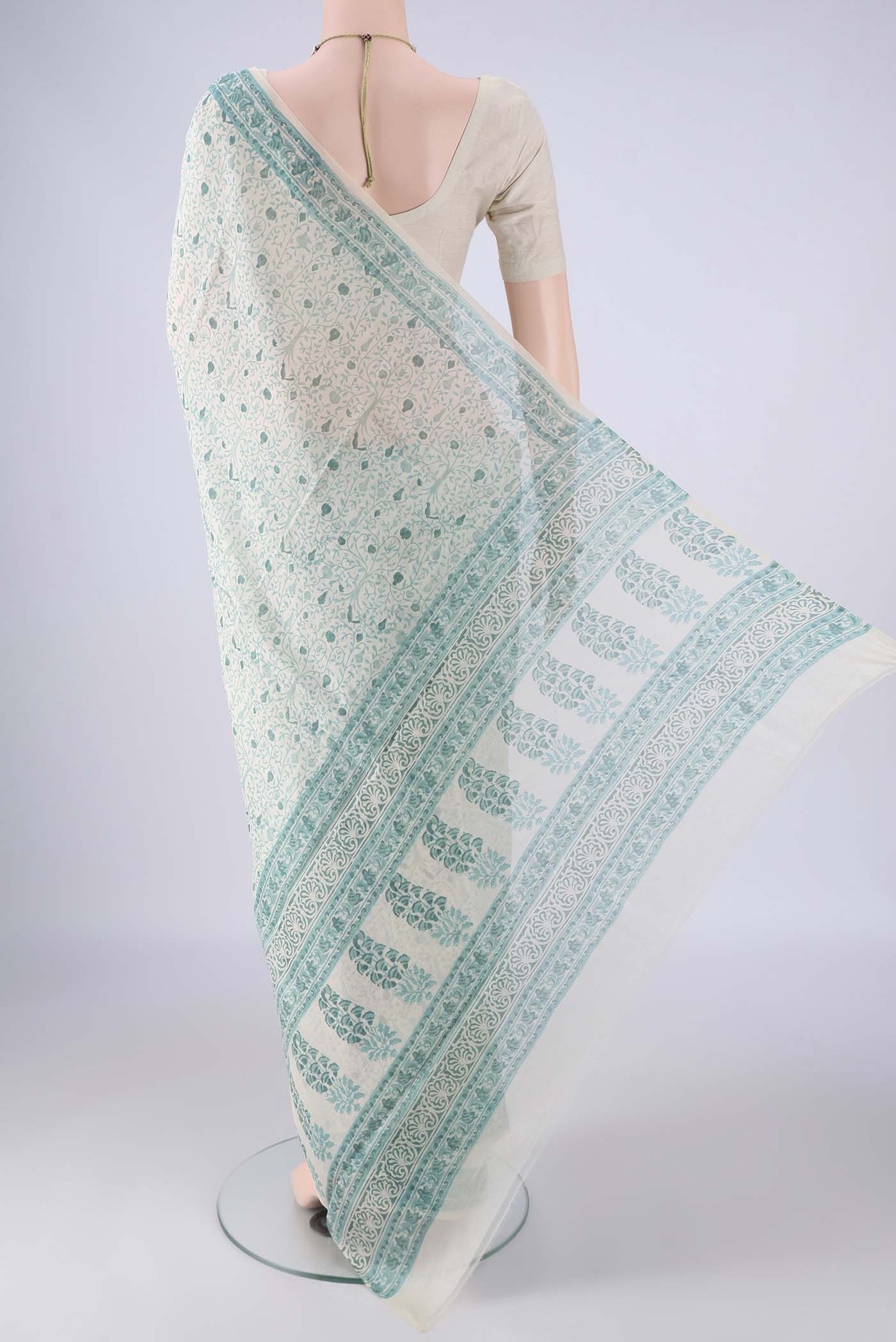Flat view of Off White Chanderi Silk Cotton Saree with Floral Print on the body and Printed Border. 