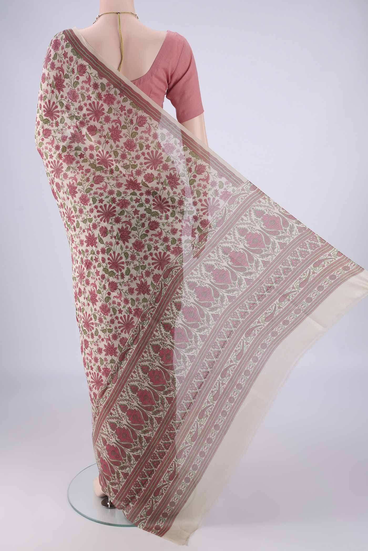 Flat view of Beige Chanderi Silk Cotton Saree with Floral Print on the body and Printed Border. 