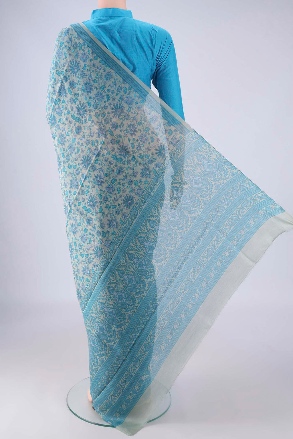 Flat view of Blue Grey Chanderi Silk Cotton Saree with Floral Print on the body and Printed Border. 