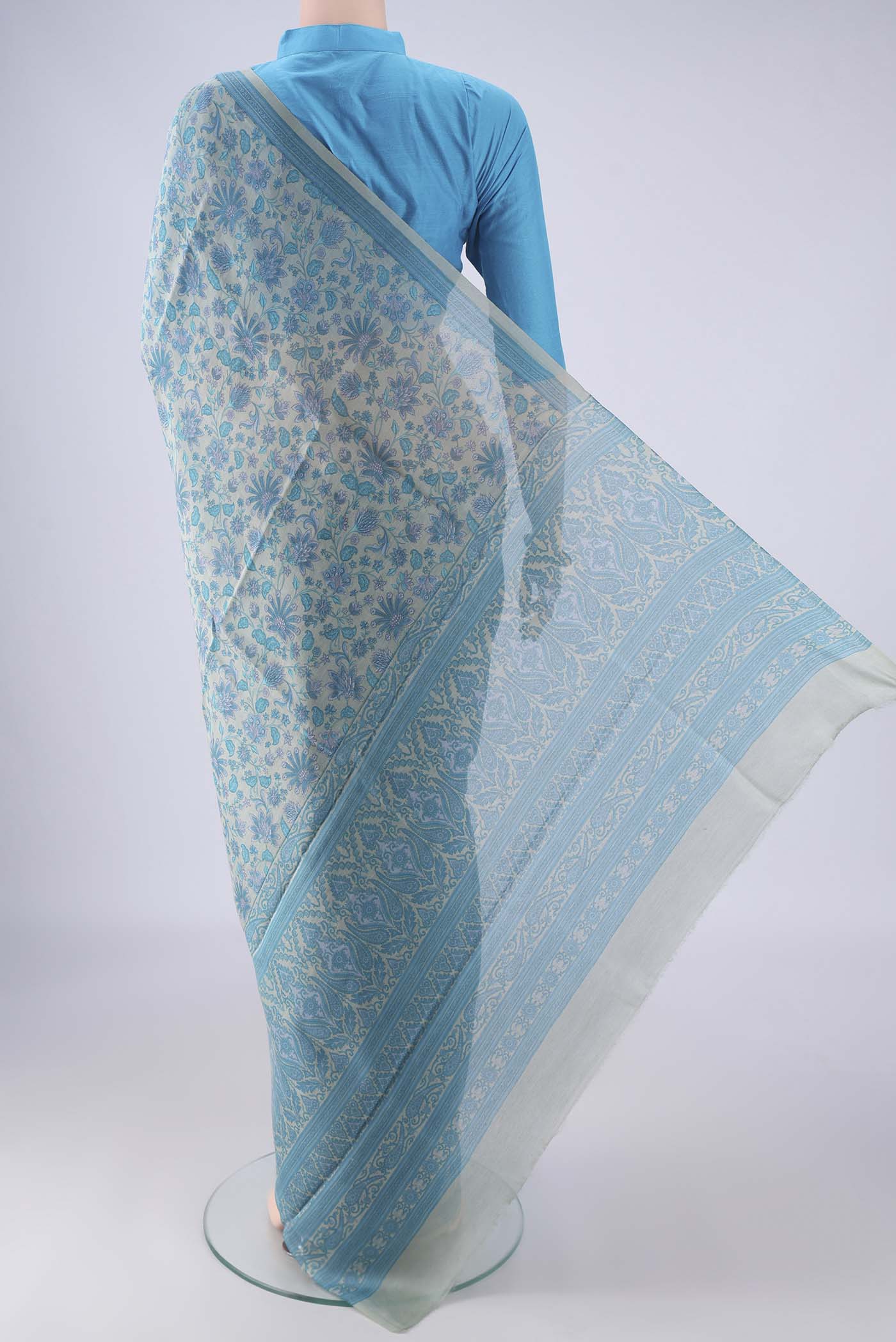 Flat view of Blue Grey Chanderi Silk Cotton Saree with Floral Print on the body and Printed Border. 