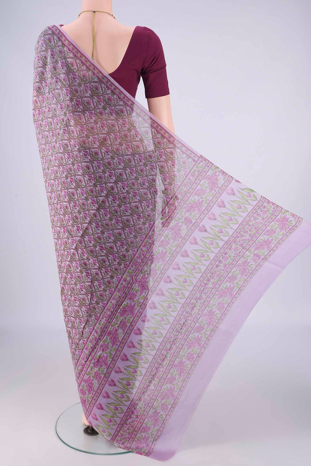 Flat view of Lavender Chanderi Silk Cotton Saree with Floral Print on the body and Printed Border. 