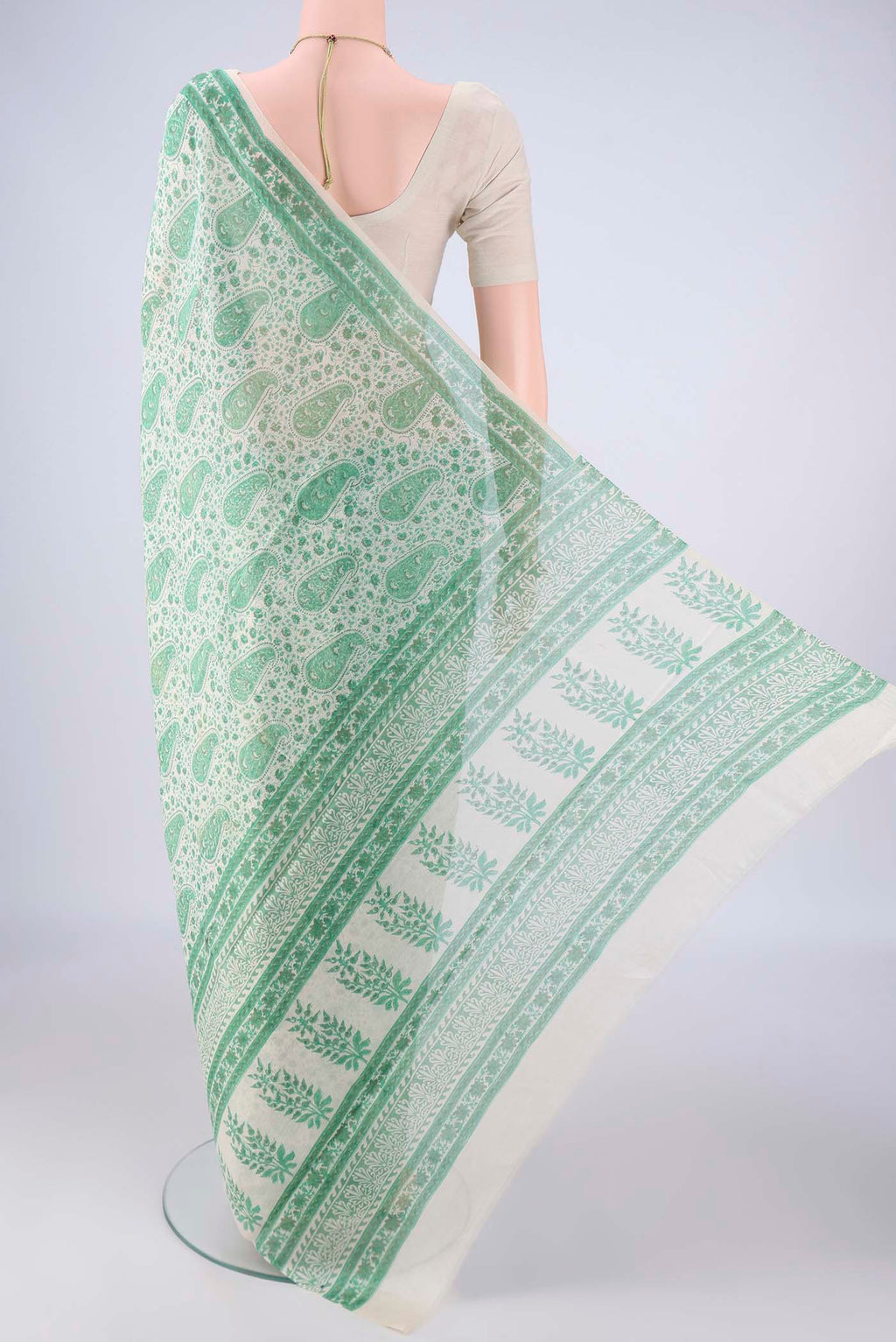 Flat view of Off White Chanderi Silk Cotton Saree with Floral Print on the body and Printed Border. 