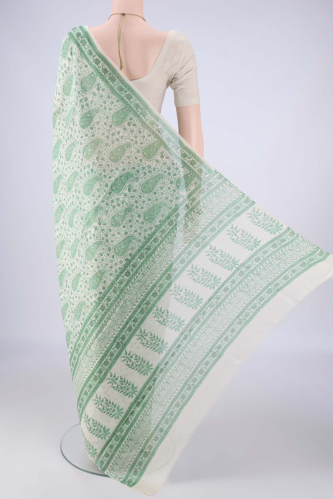 Flat view of Off White Chanderi Silk Cotton Saree with Floral Print on the body and Printed Border. 