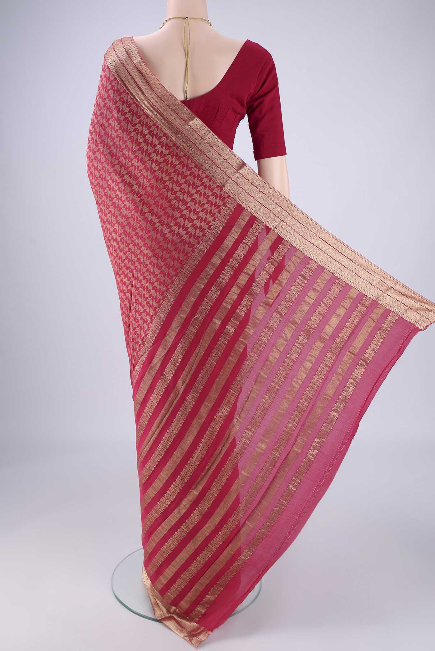 Flat view of Dark Pink Mysore Crepe Saree with Zari Brocade on the body and Zari Border. 