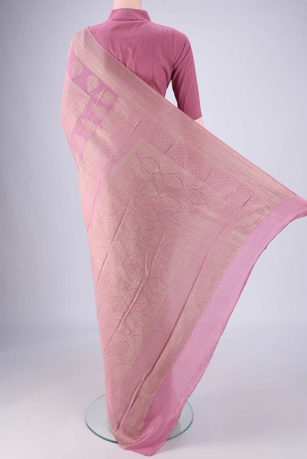 Flat view of Lavender Mysore Crepe Saree with Zari Brocade on the body and Zari Border. 