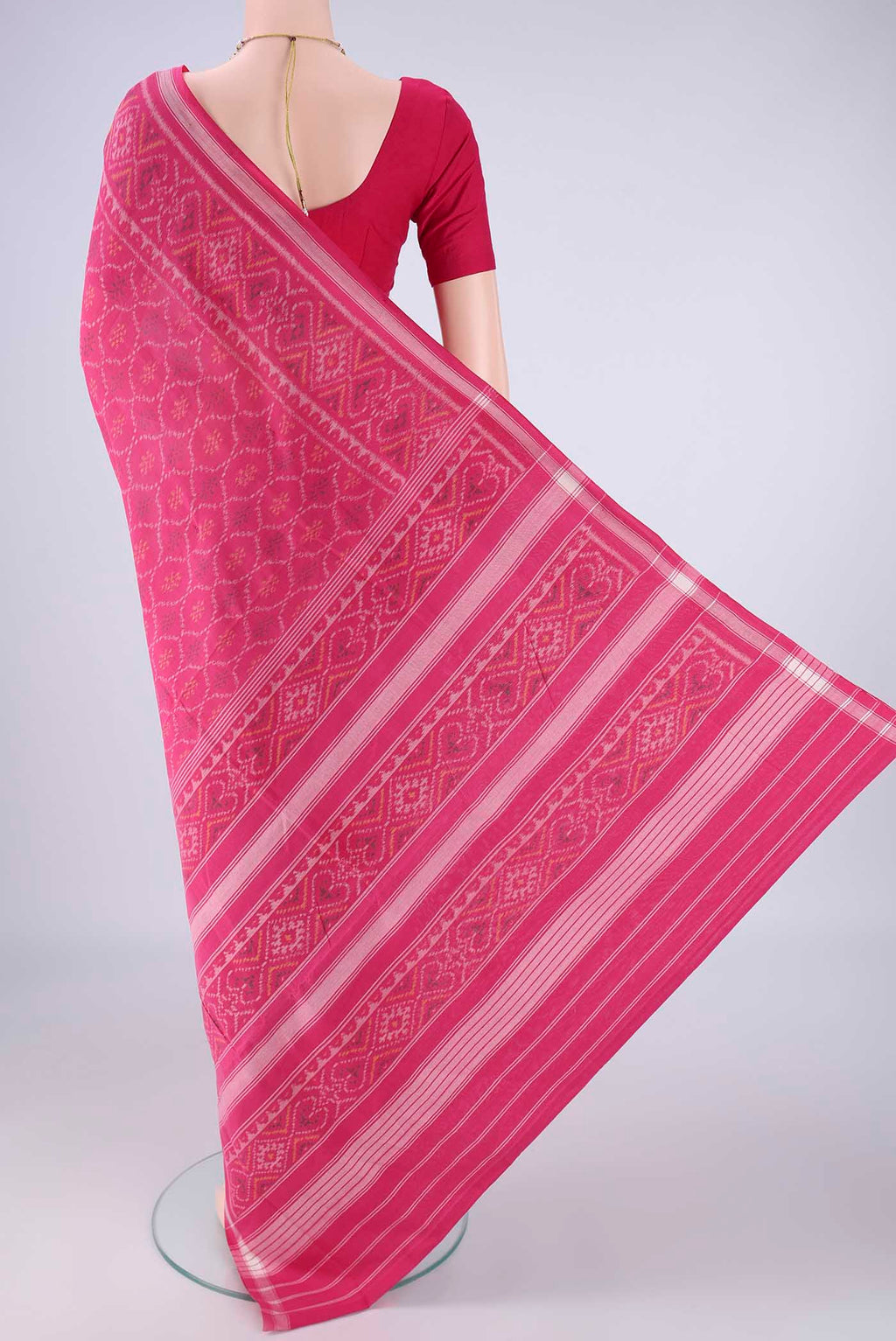 Flat view of Pink Pochampally Cotton Saree with Pure Ikat on the body and Ikat Border. 