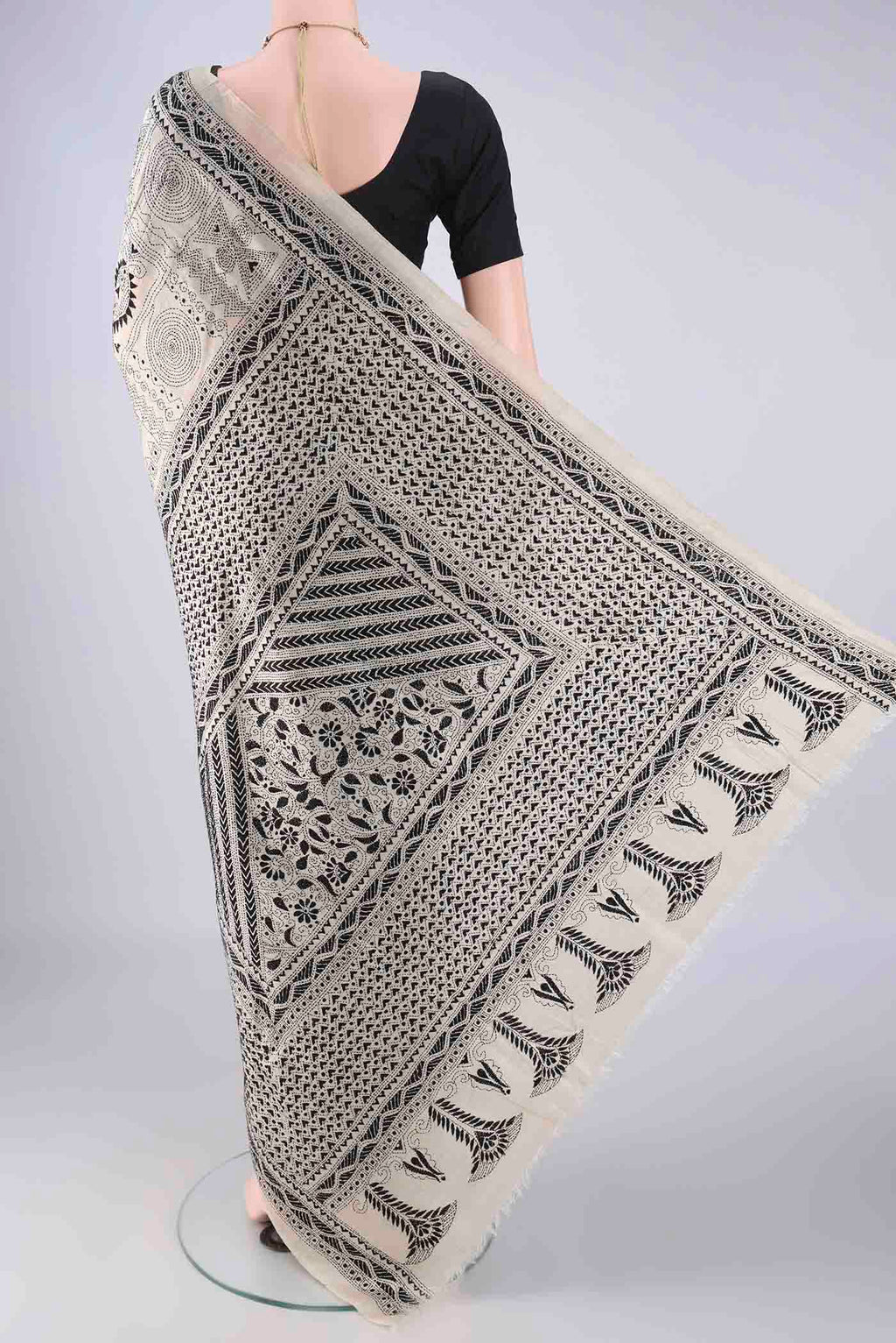 Flat view of Beige Tussar Silk Saree with Kantha Work on the body and Thread Border. 