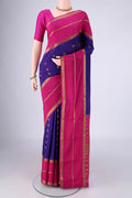 Blue Mysore Crepe Saree with Zari Butta on the body and Zari Border.  displayed on a mannequin