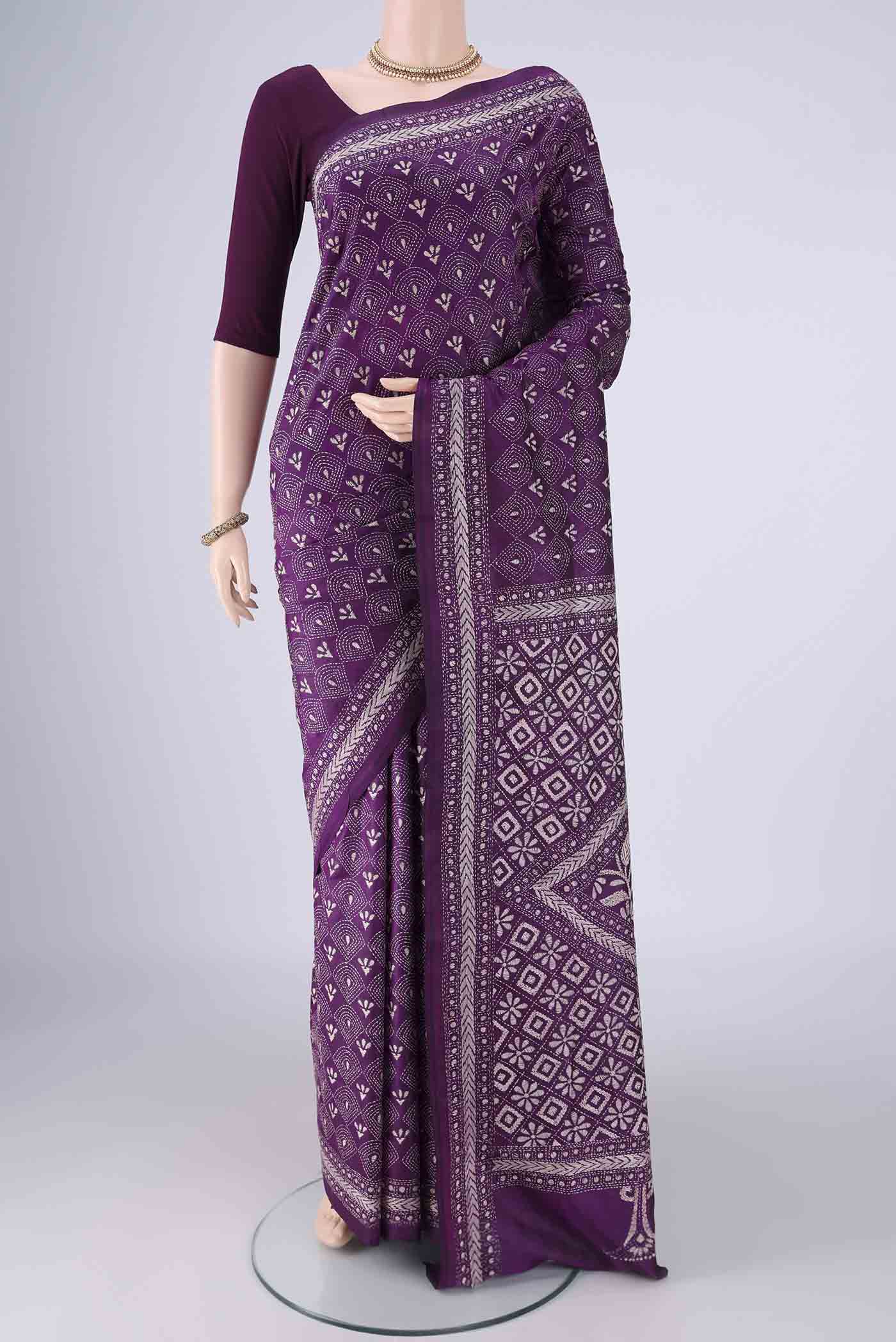 Purple Kantha Silk Saree with Kantha Work on the body and Thread Border.  displayed on a mannequin